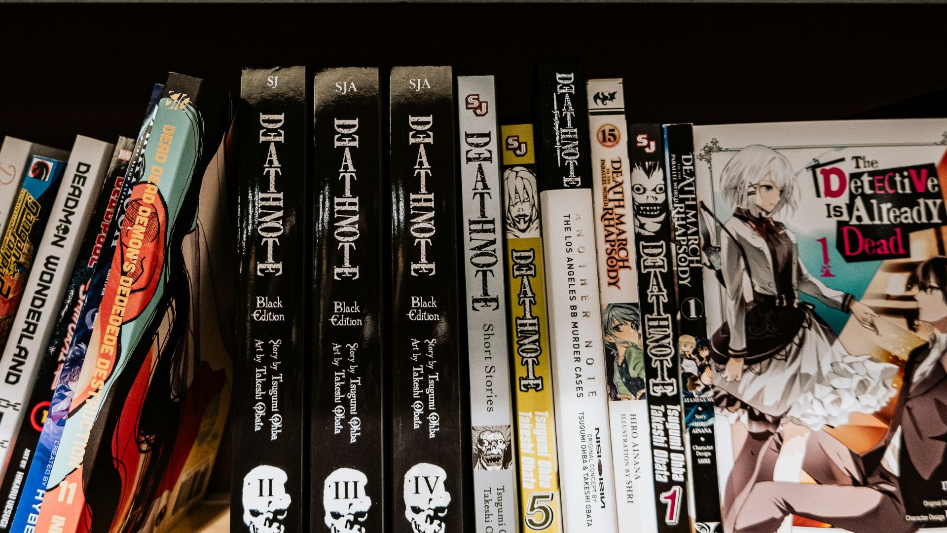 a bunch of books that are on a shelf