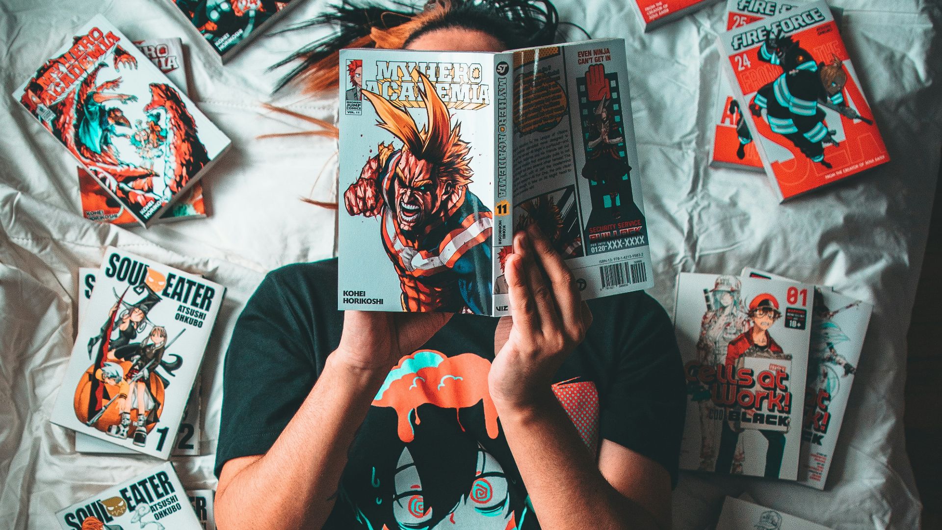 a person holding a bunch of cards