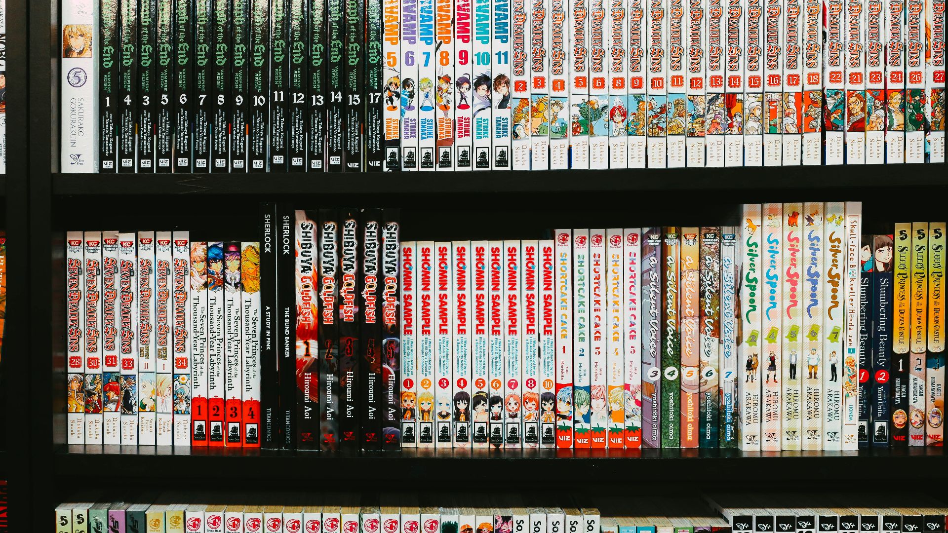 assorted-title books on rack