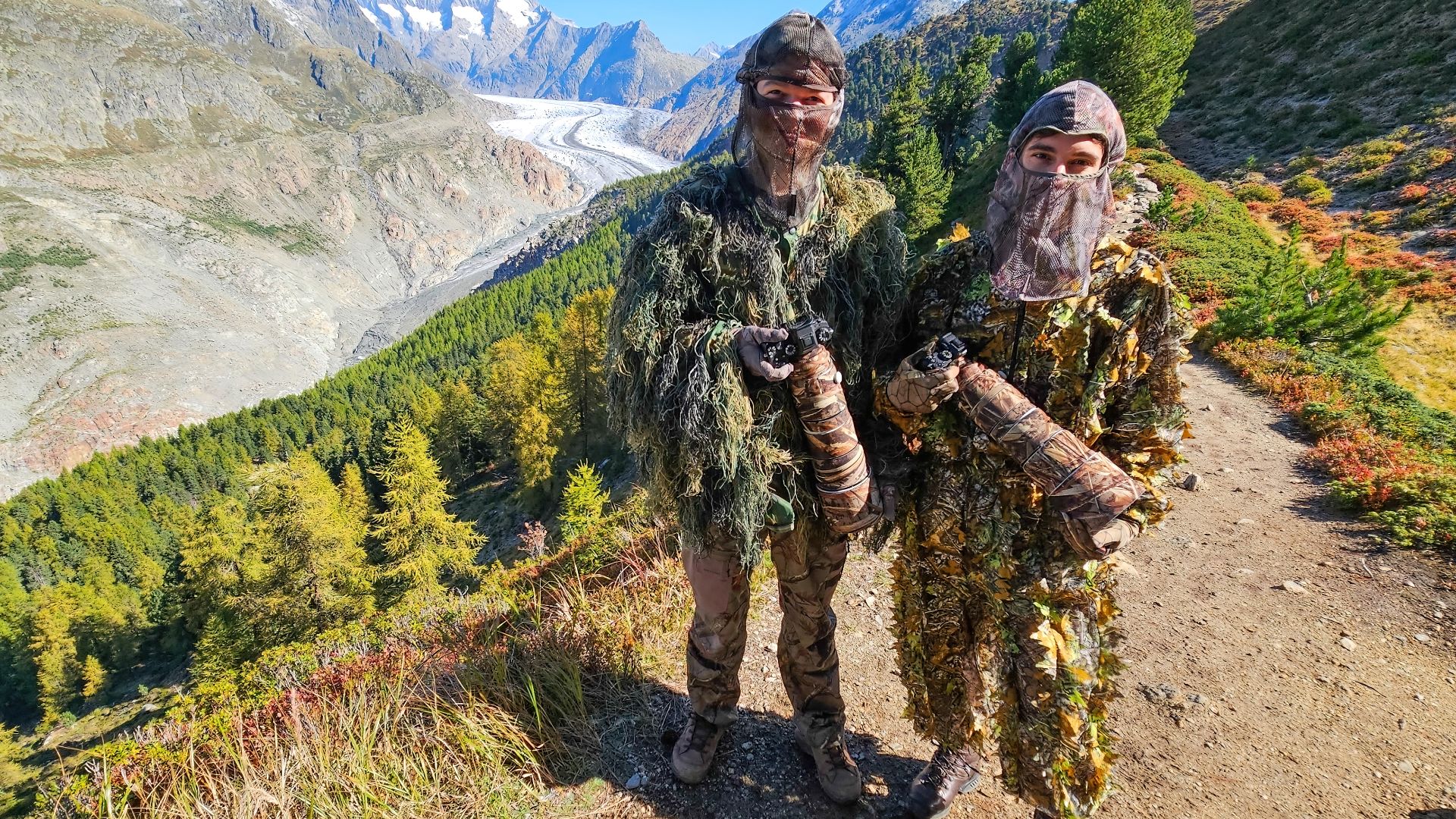 File:009 Wildlife Photographers in ghillie suits looking for red deers 3.jpg