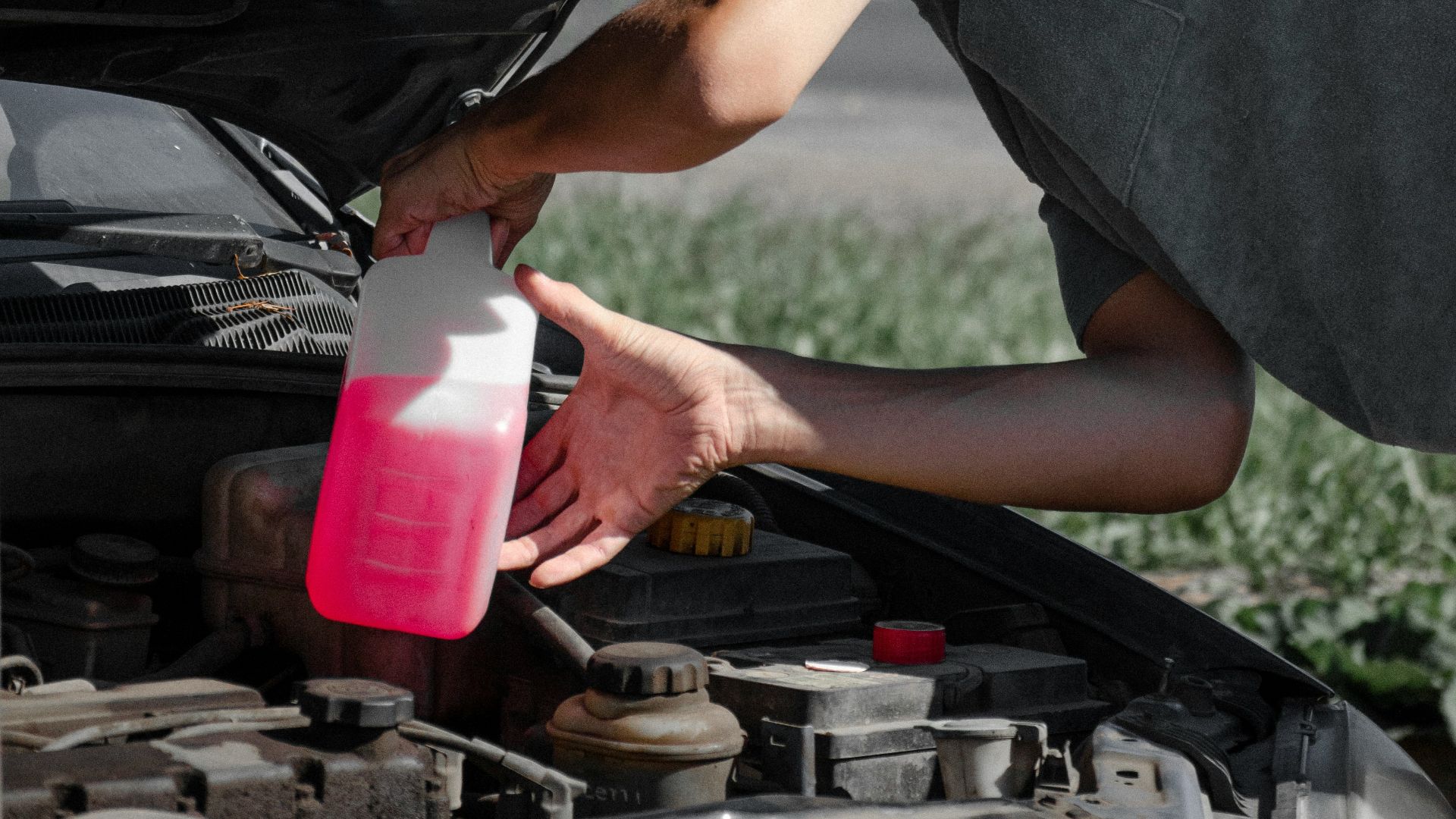 a man working on a car