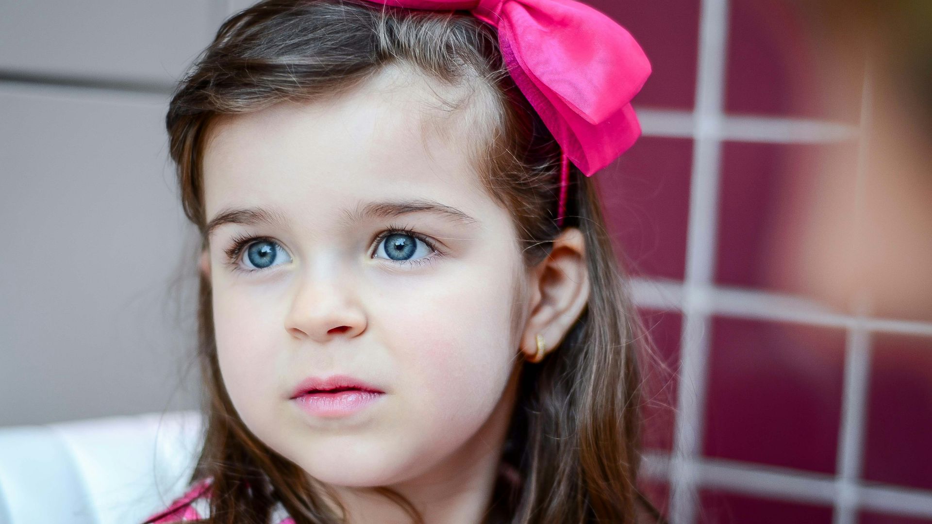 girl wearing pink headband