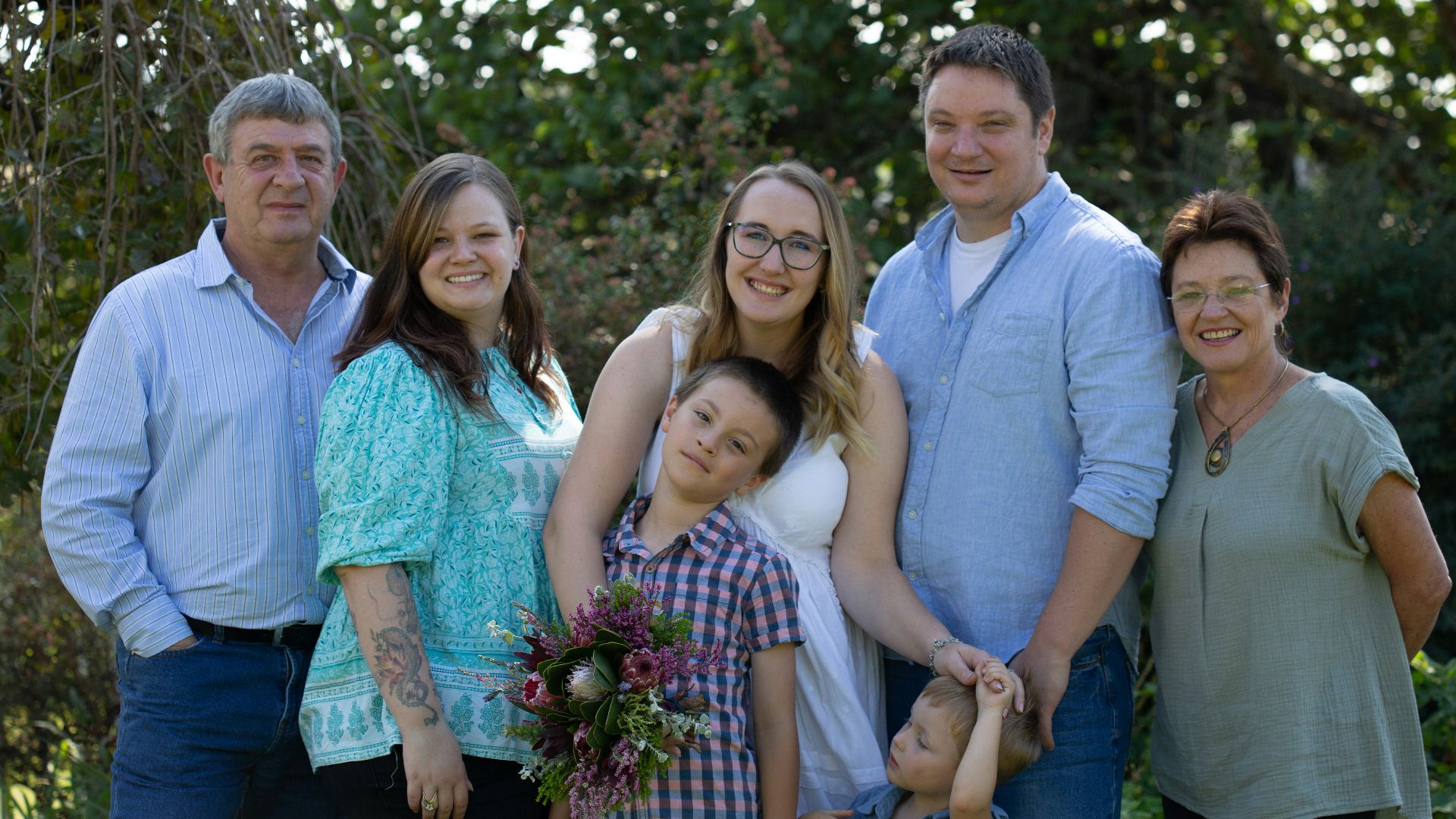 a group of people standing next to each other