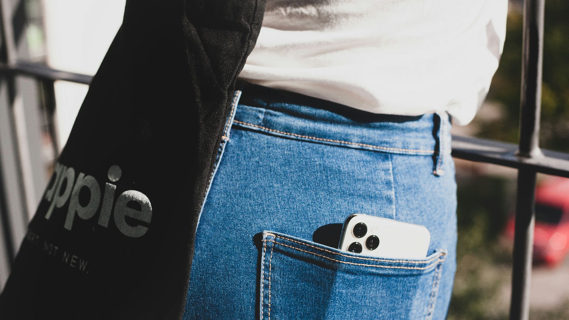 person in blue denim bottoms