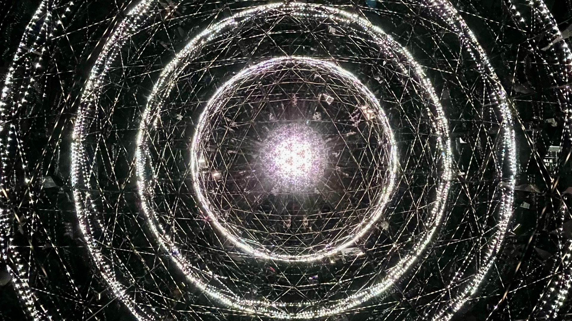 a spiral of lights in the middle of a room