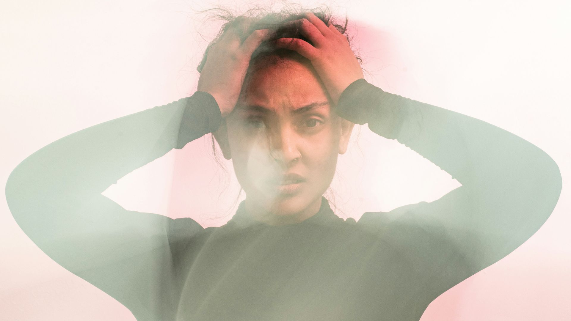 woman in gray turtleneck long sleeve shirt