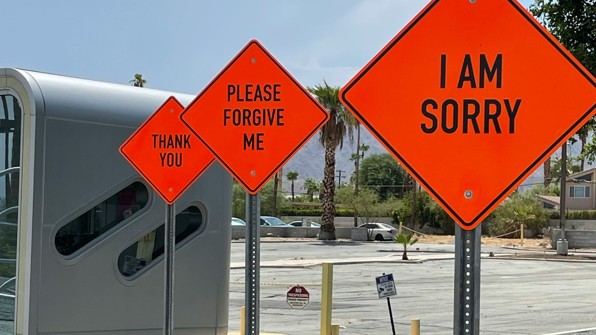 white and red street sign
