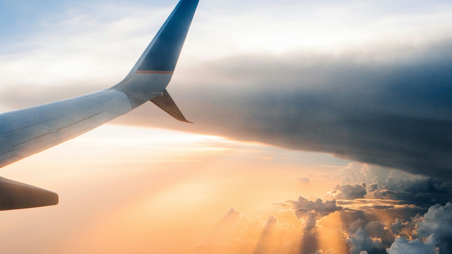 airplane on sky during golden hour