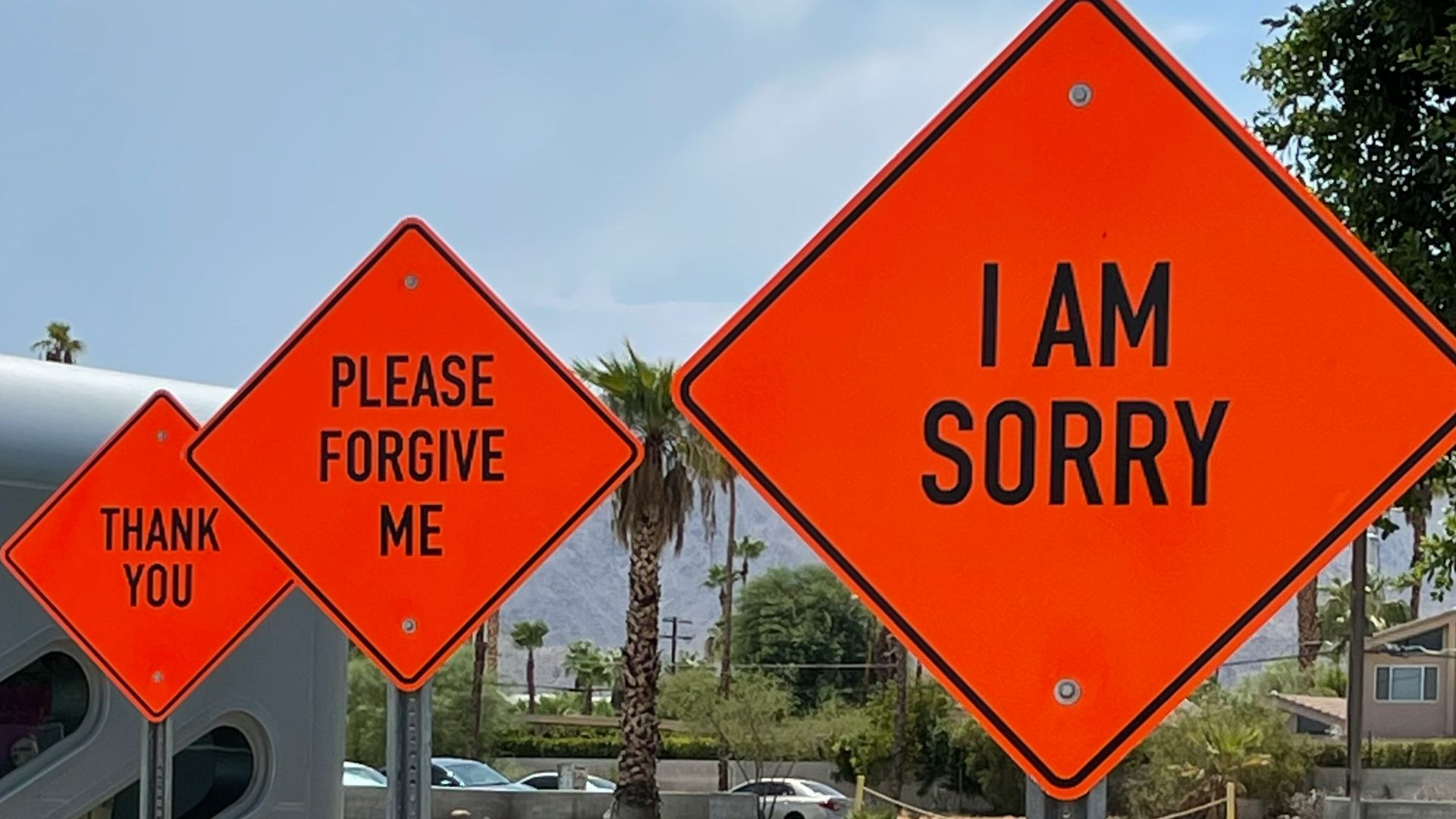white and red street sign