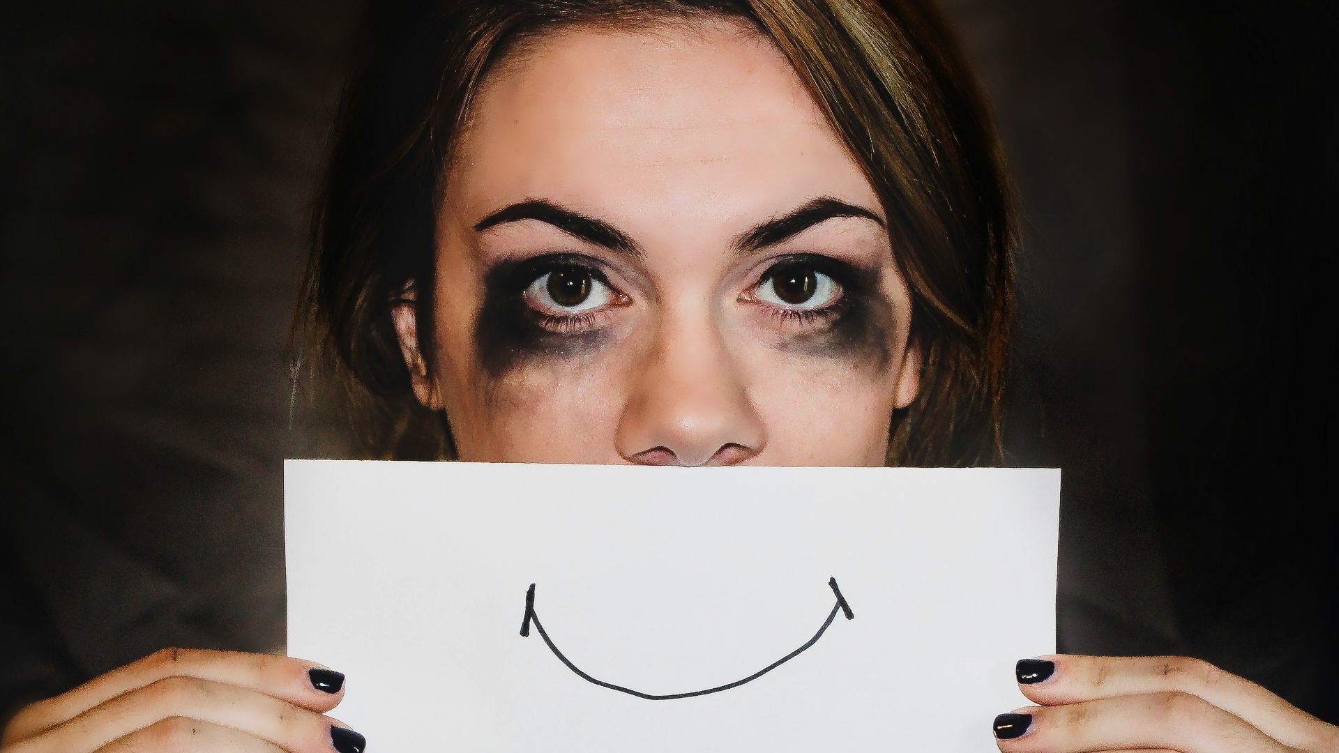 person holding white printer paper