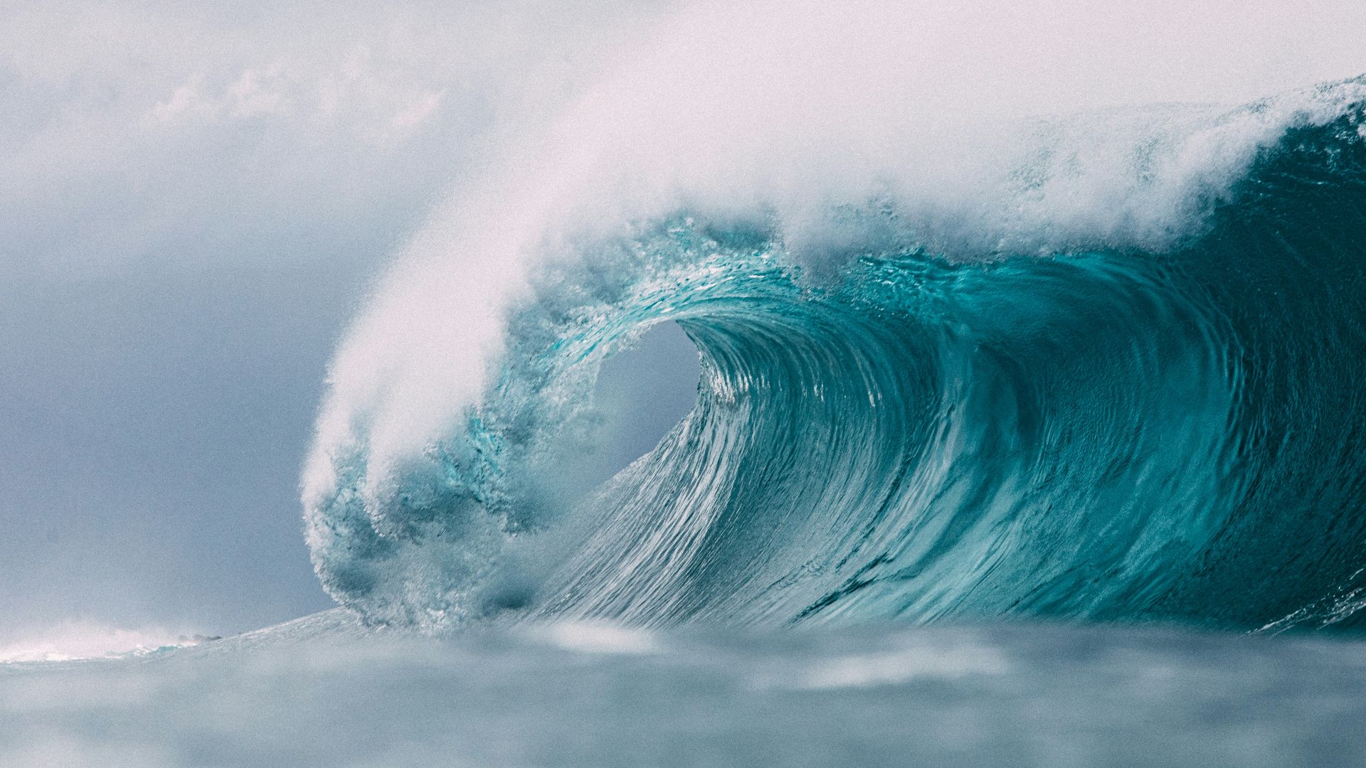 white and blue ocean waves