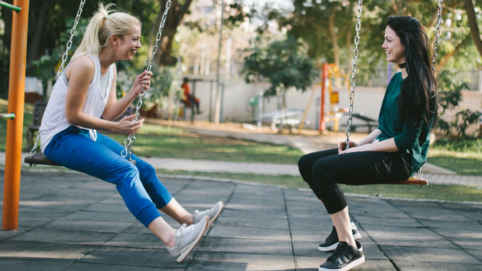 woman sitting on swing