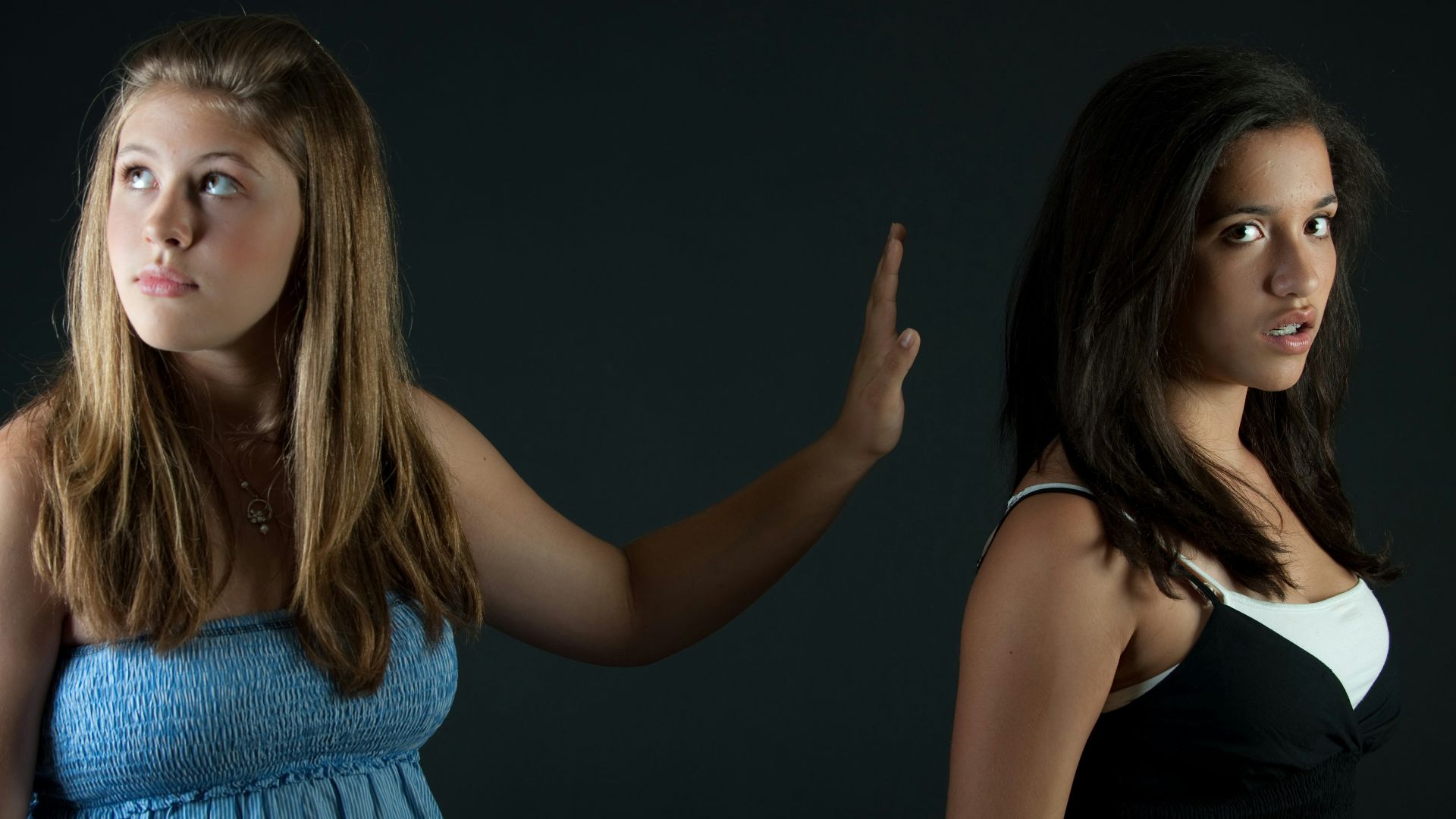 girl in blue sleeveless dress