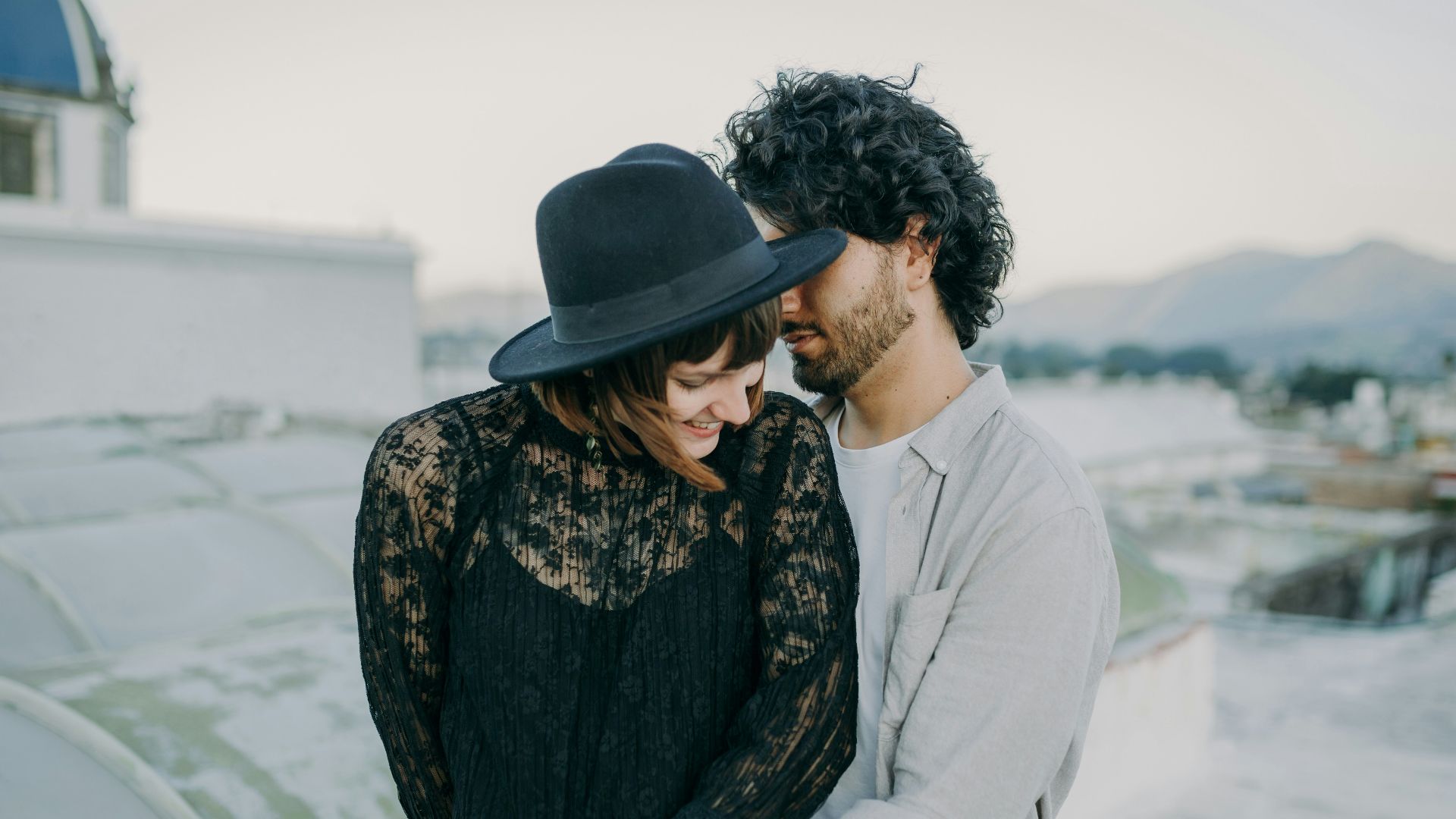 a man and a woman standing next to each other