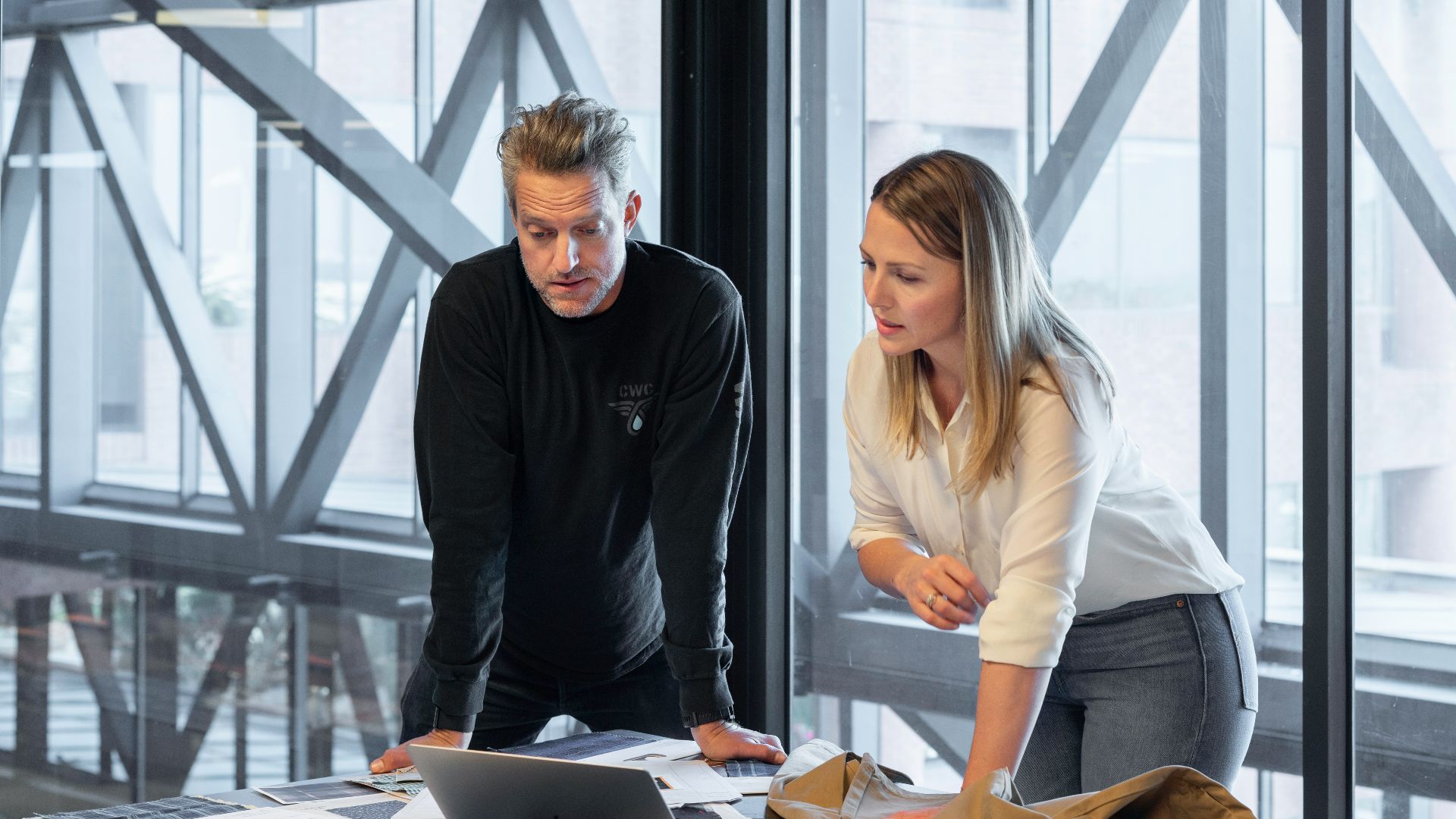 man and woman sitting at table