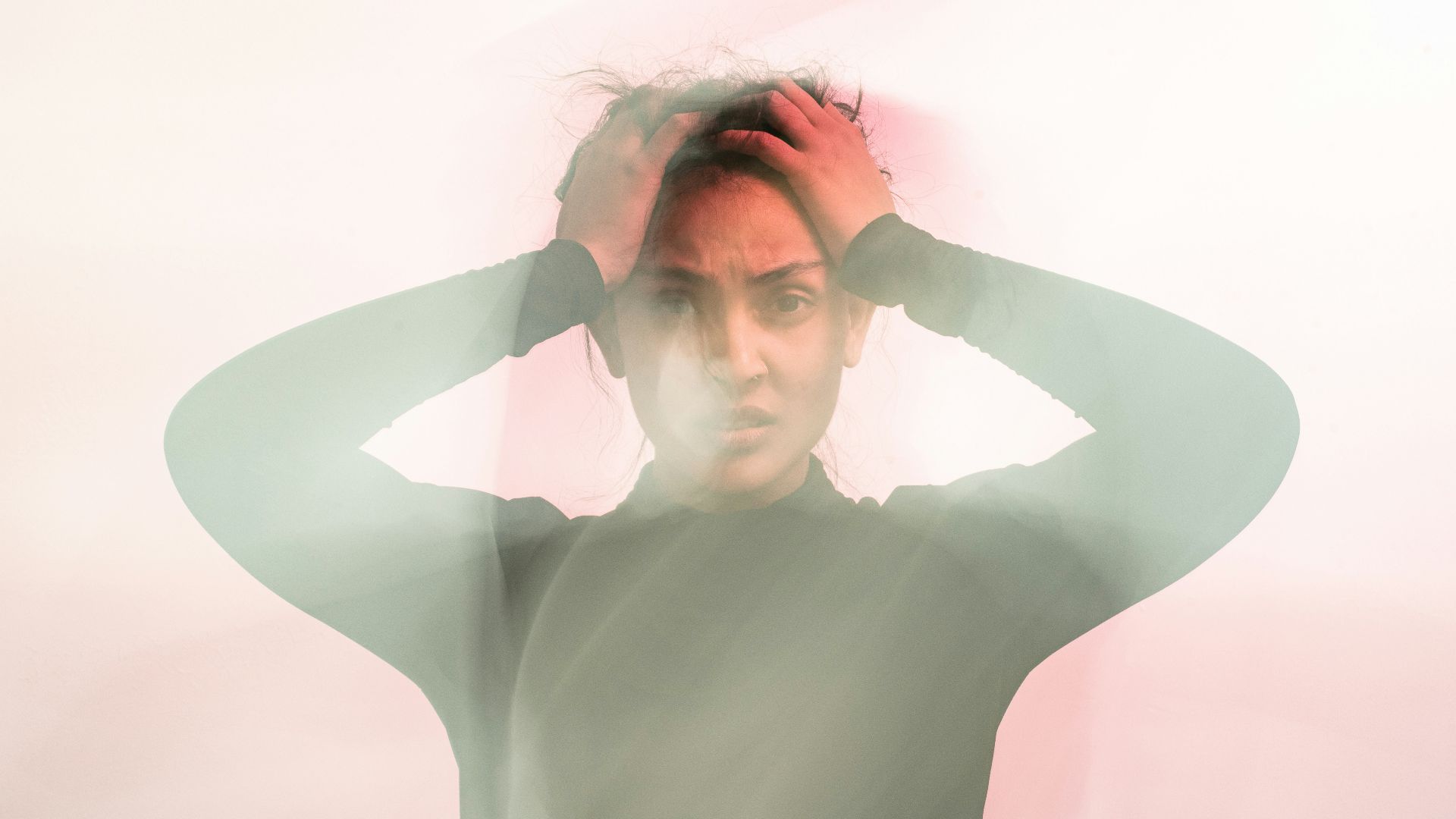 woman in gray turtleneck long sleeve shirt