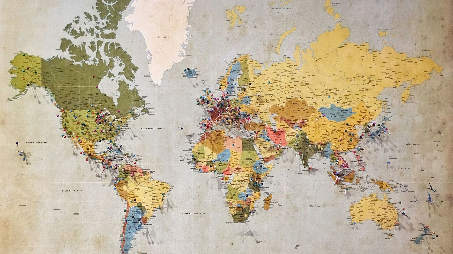 blue, green, and yellow world map