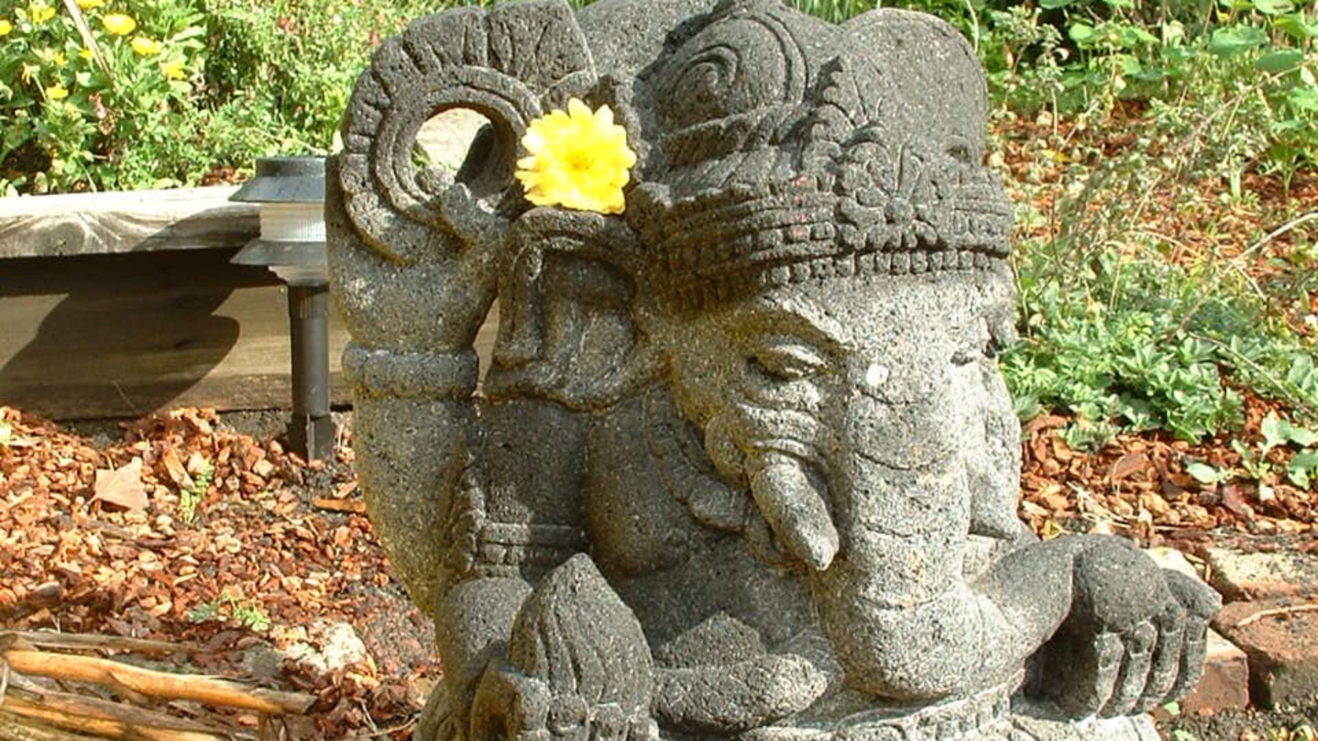 File:Ganesh with flower.jpg