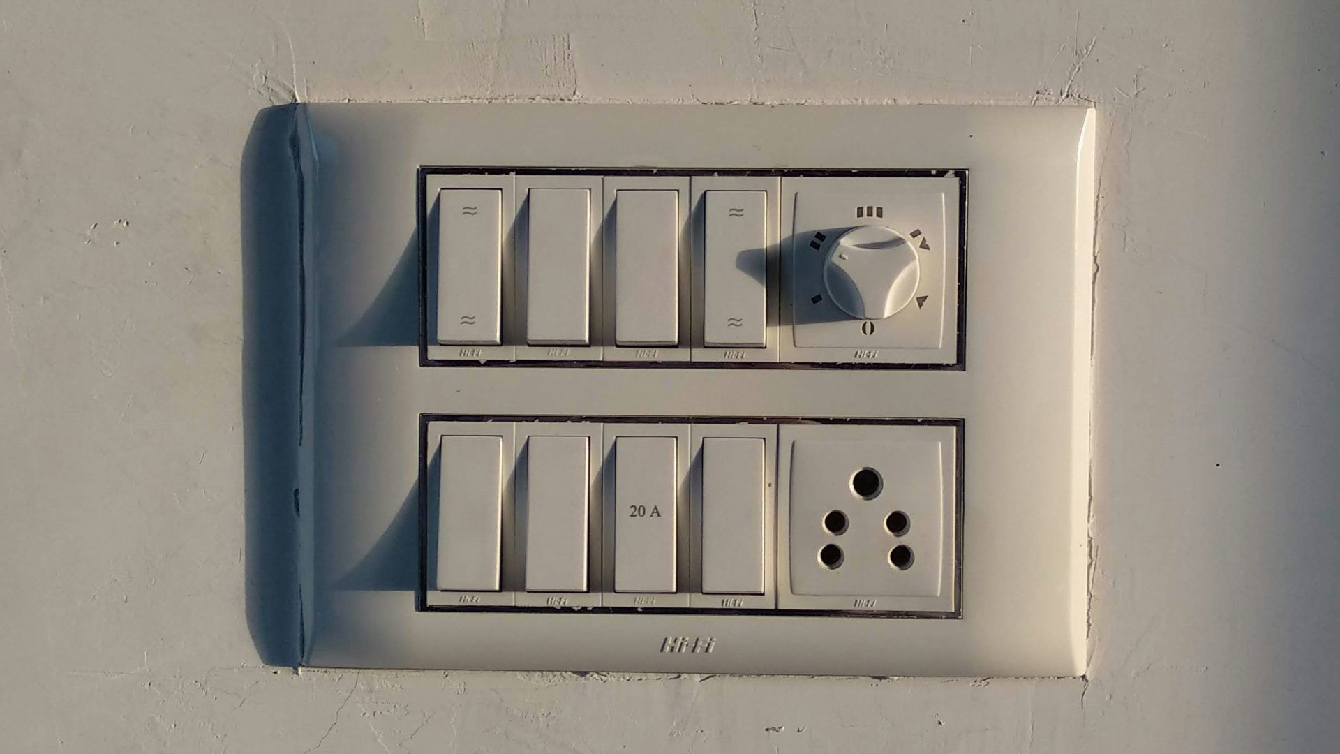white wall mounted electric socket