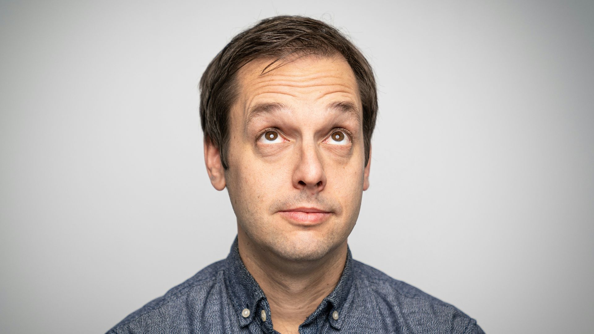 a man with a surprised look on his face