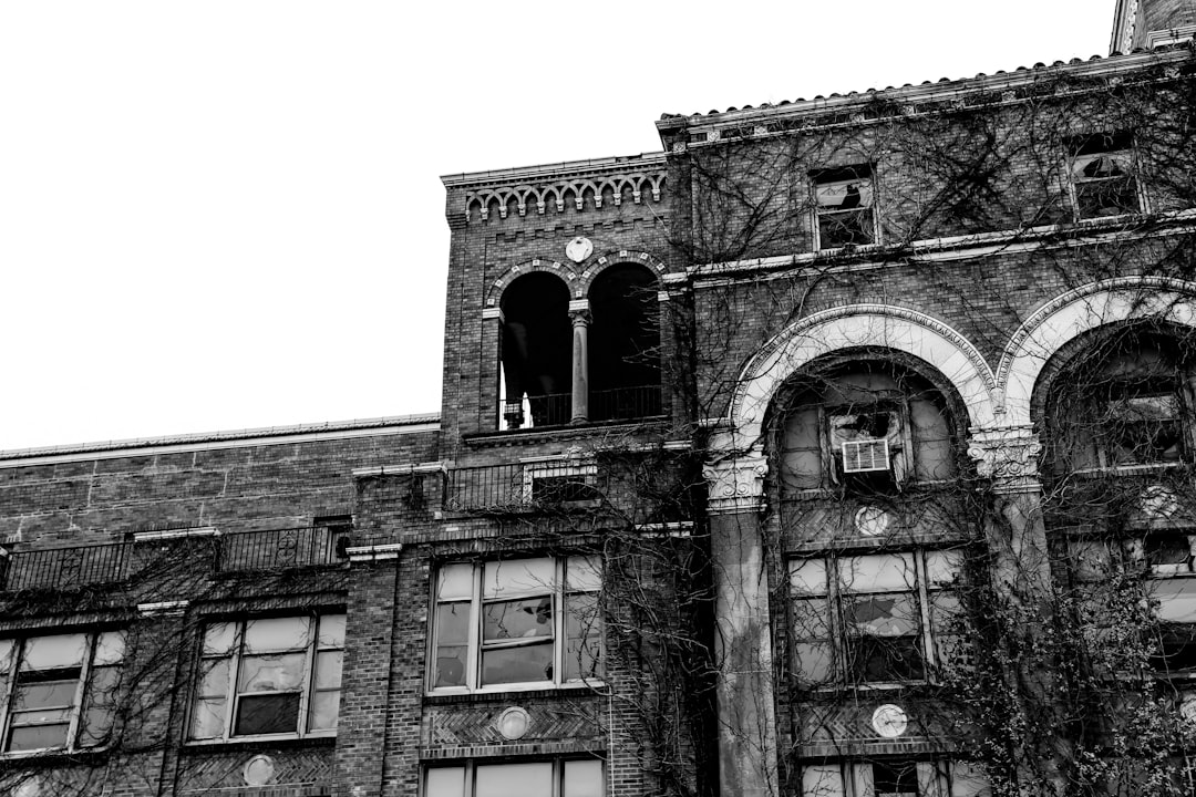 gray concrete building under white sky during daytime