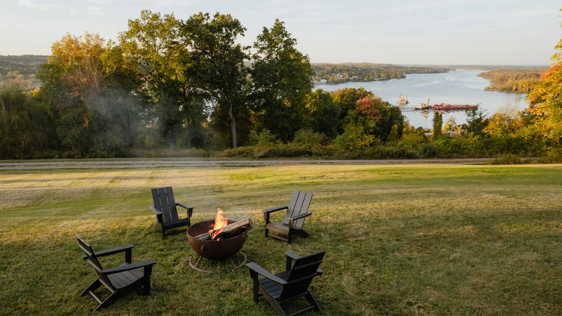 A fire pit sitting in the middle of a field