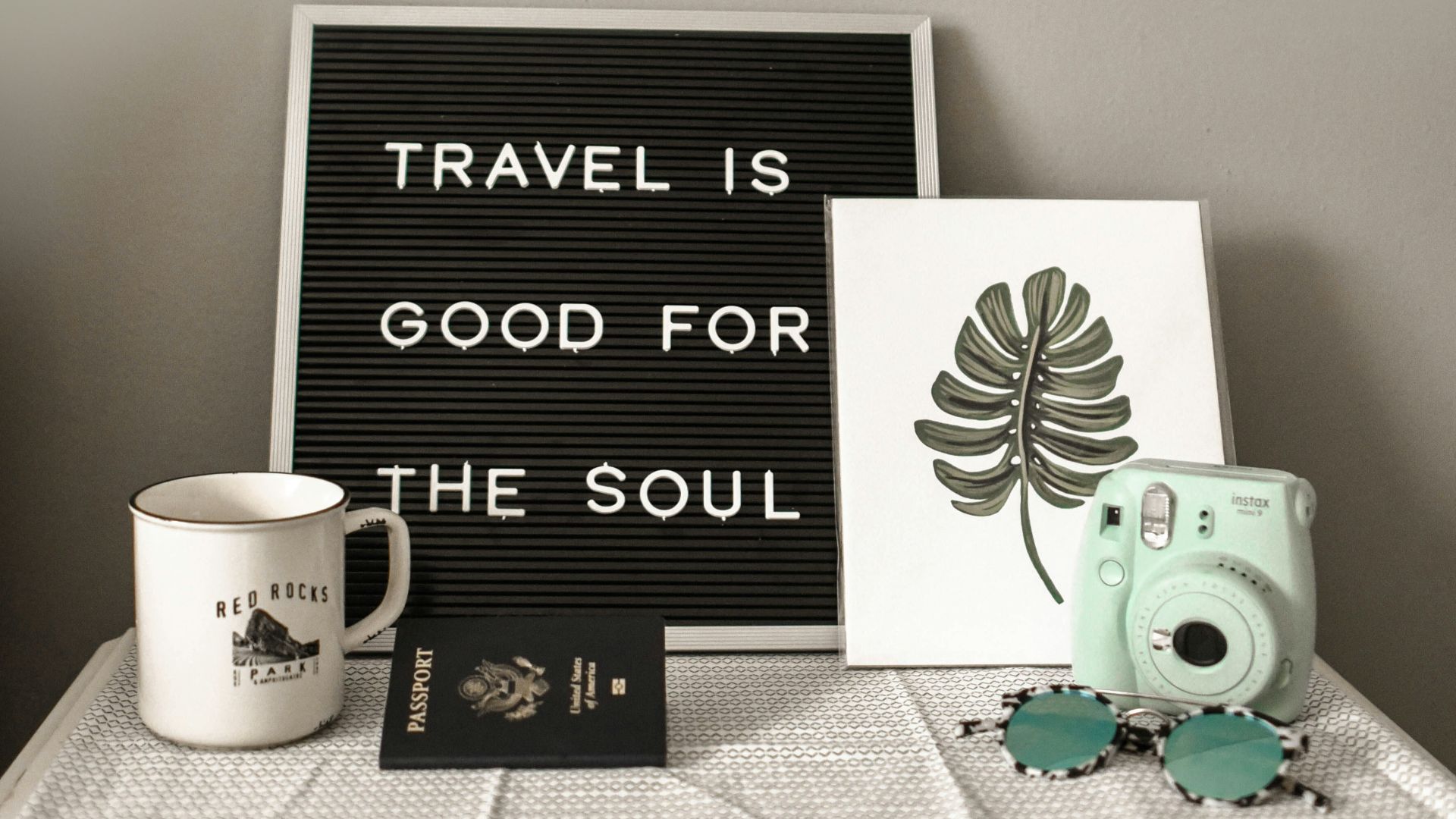 teal Instax Mini 8 instant camera near decor