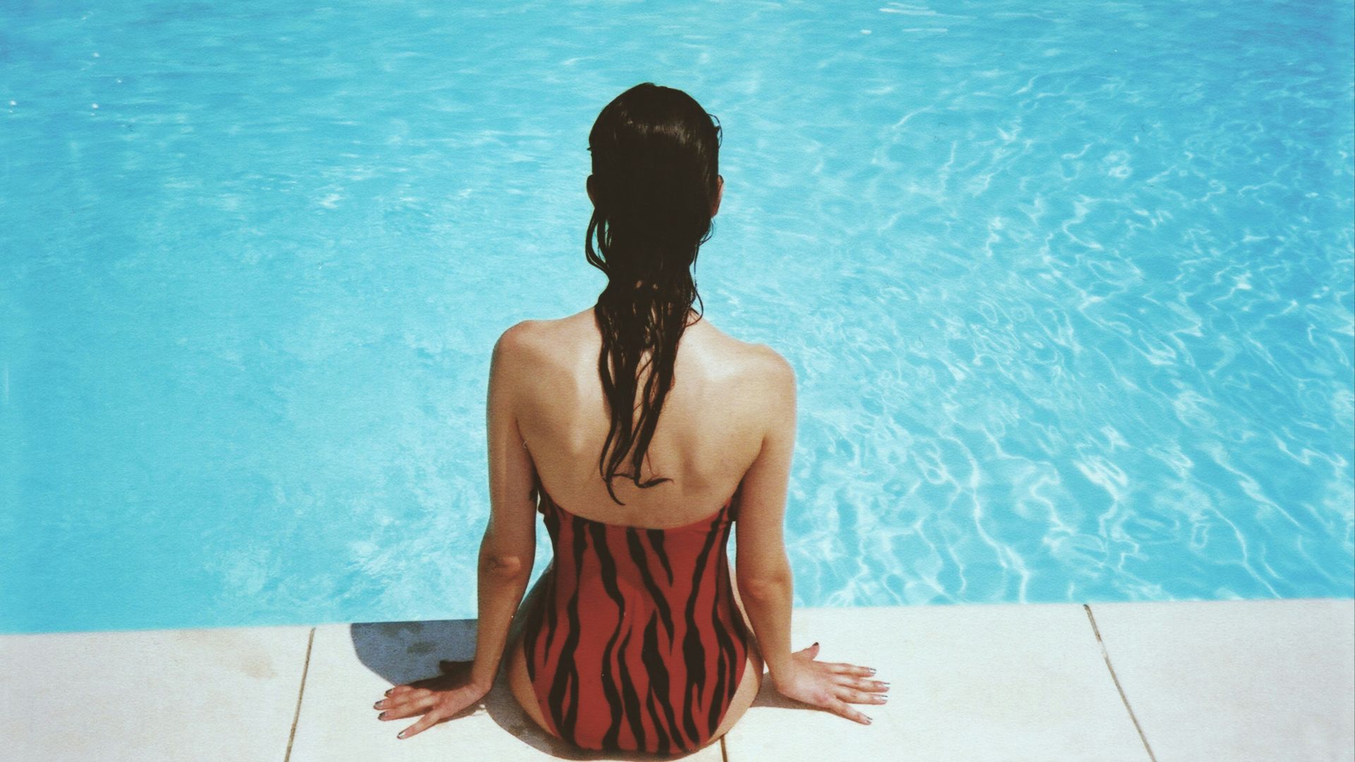 woman wearing black and red monokini