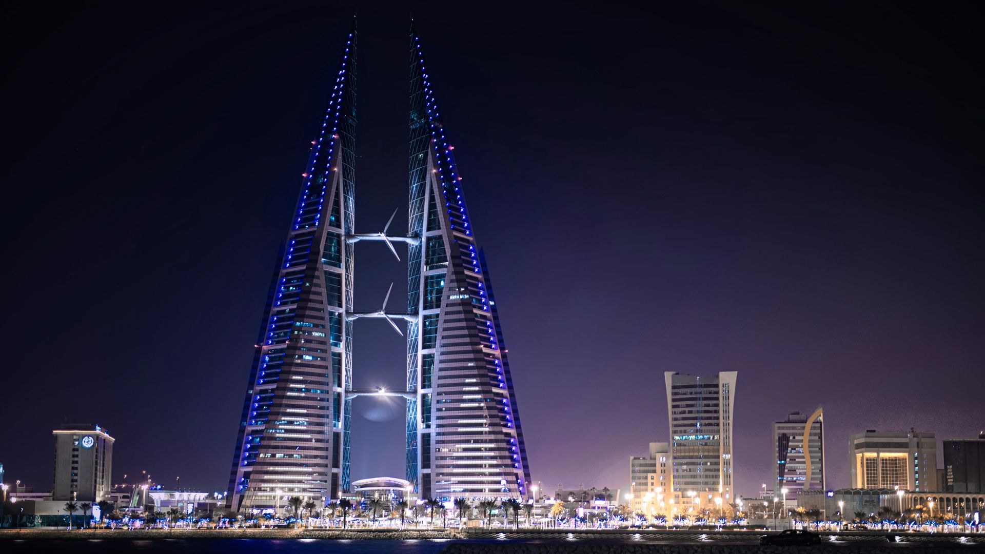 triangular-shape tower near body of water