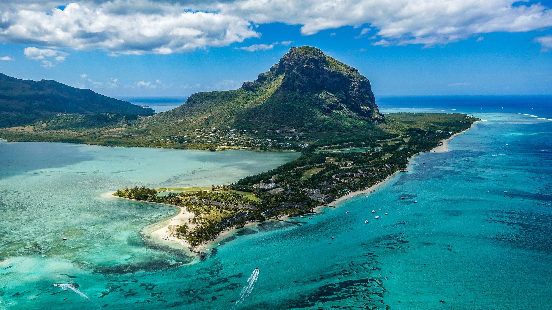 aerial photography of island beside body of water
