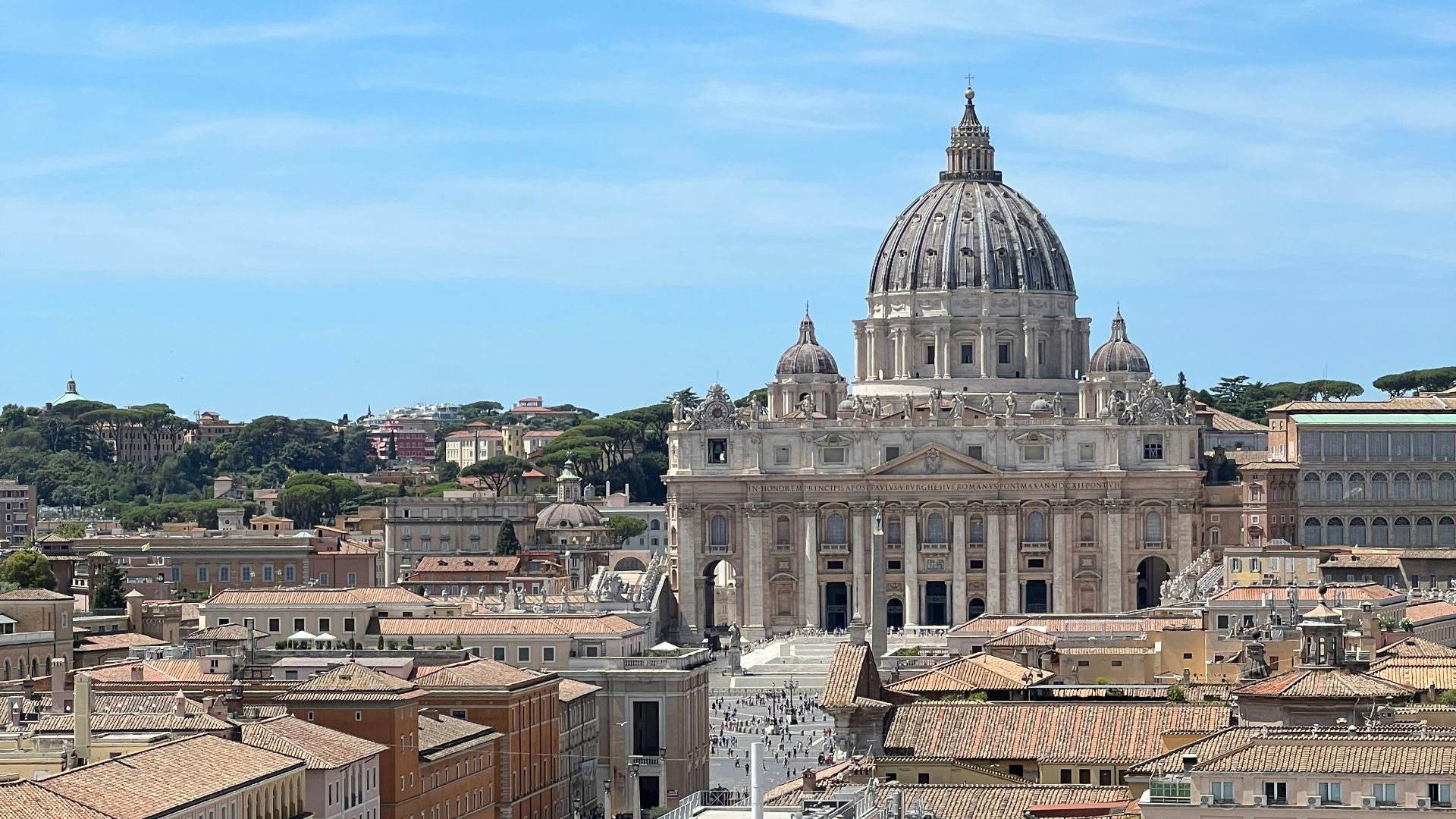 a view of a city with a dome in the background