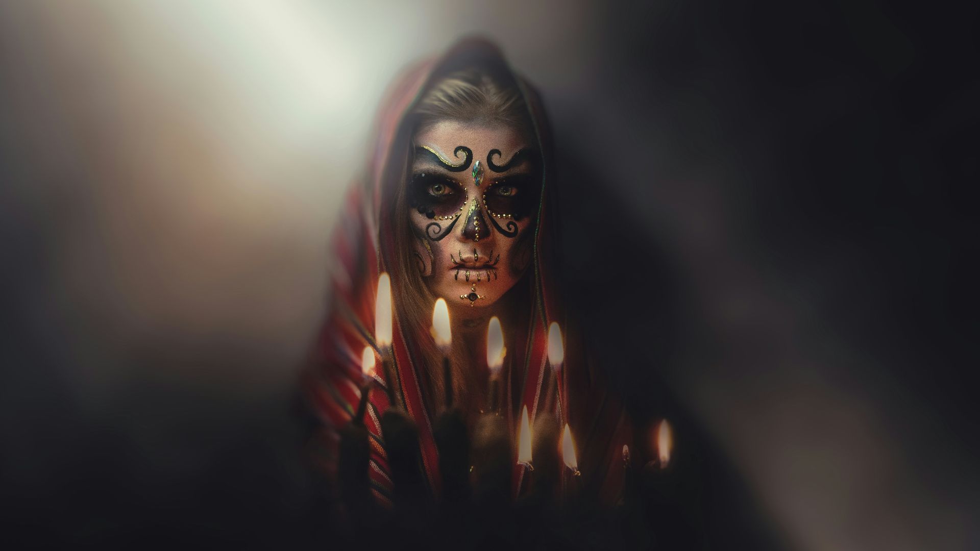 person wearing mask with black background