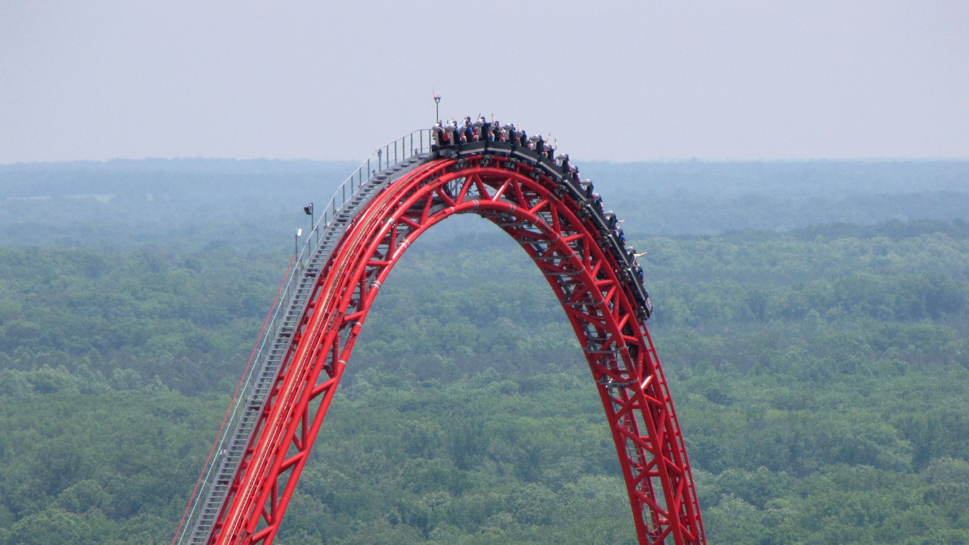 File:Train going over top of Intimidator 305.jpg