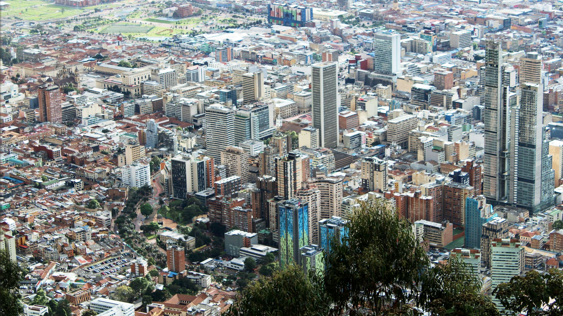 A view of a city from the top of a hill