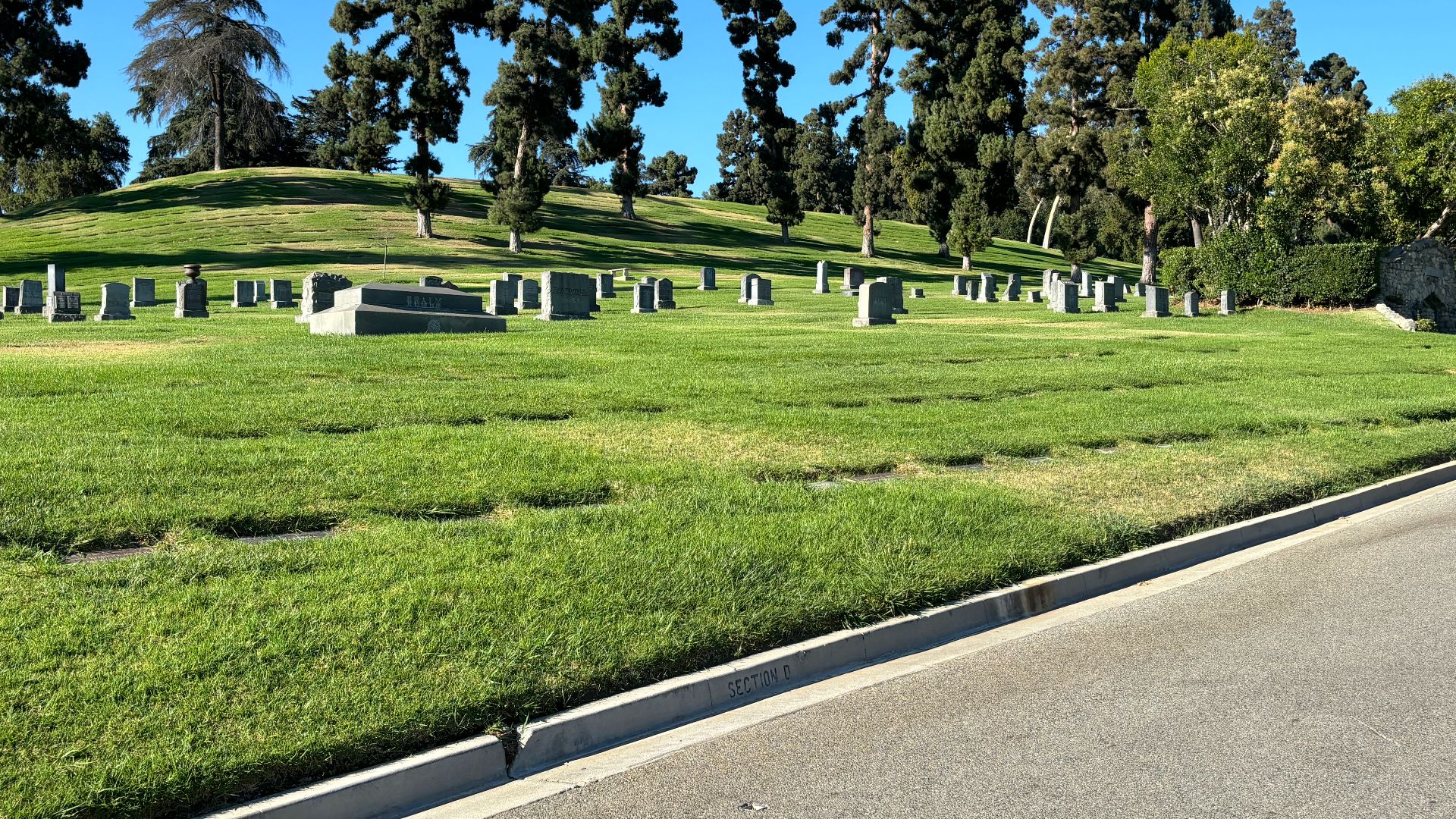 File:Graves at Forest Lawn Memorial Park (Glendale) July 2024.JPG