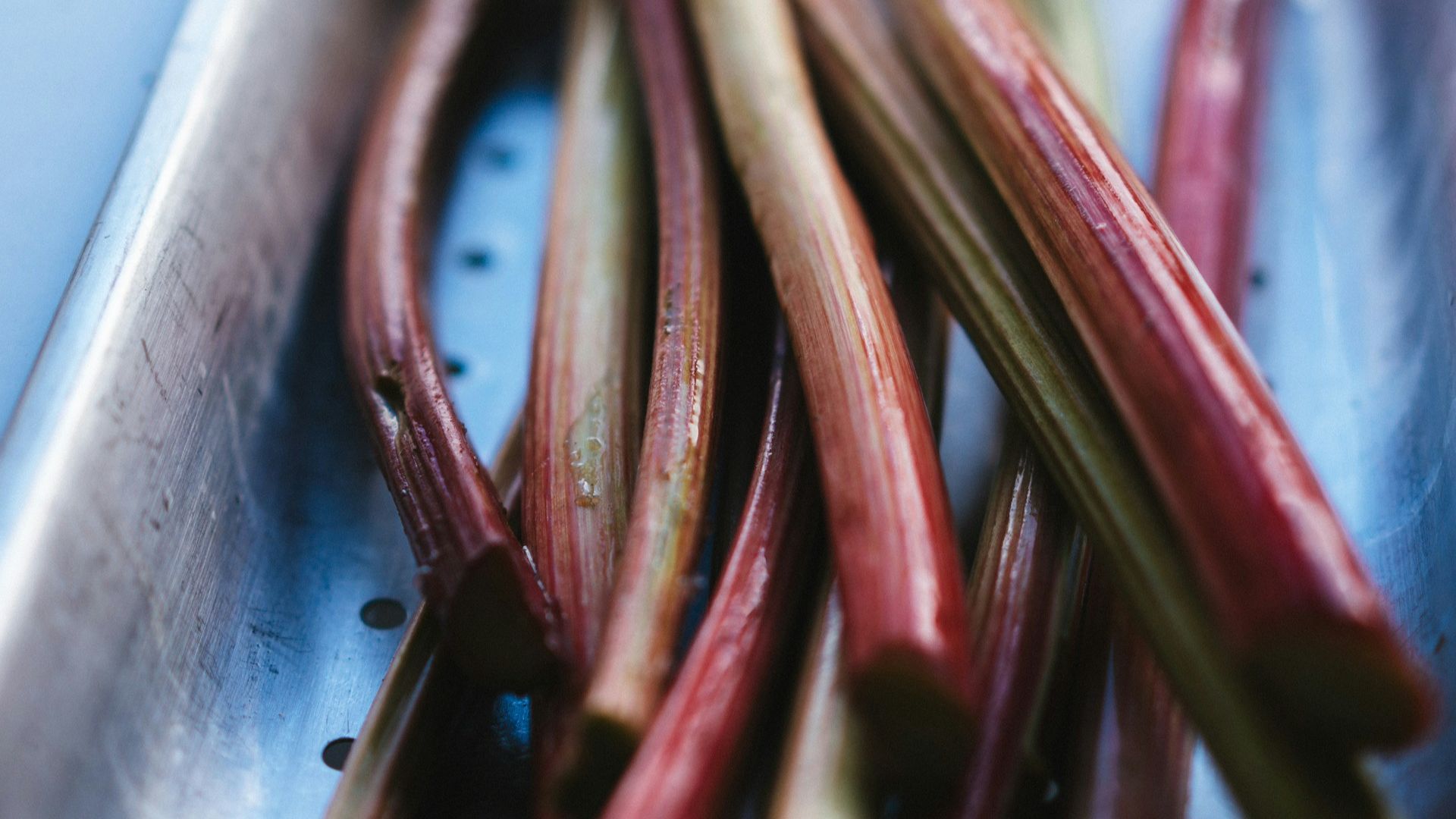 a bunch of rhubaras sitting in a metal pan