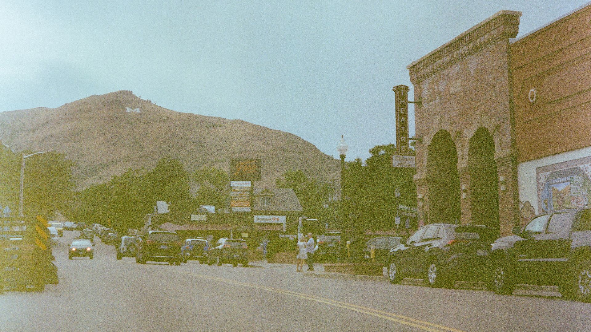a city street filled with lots of traffic