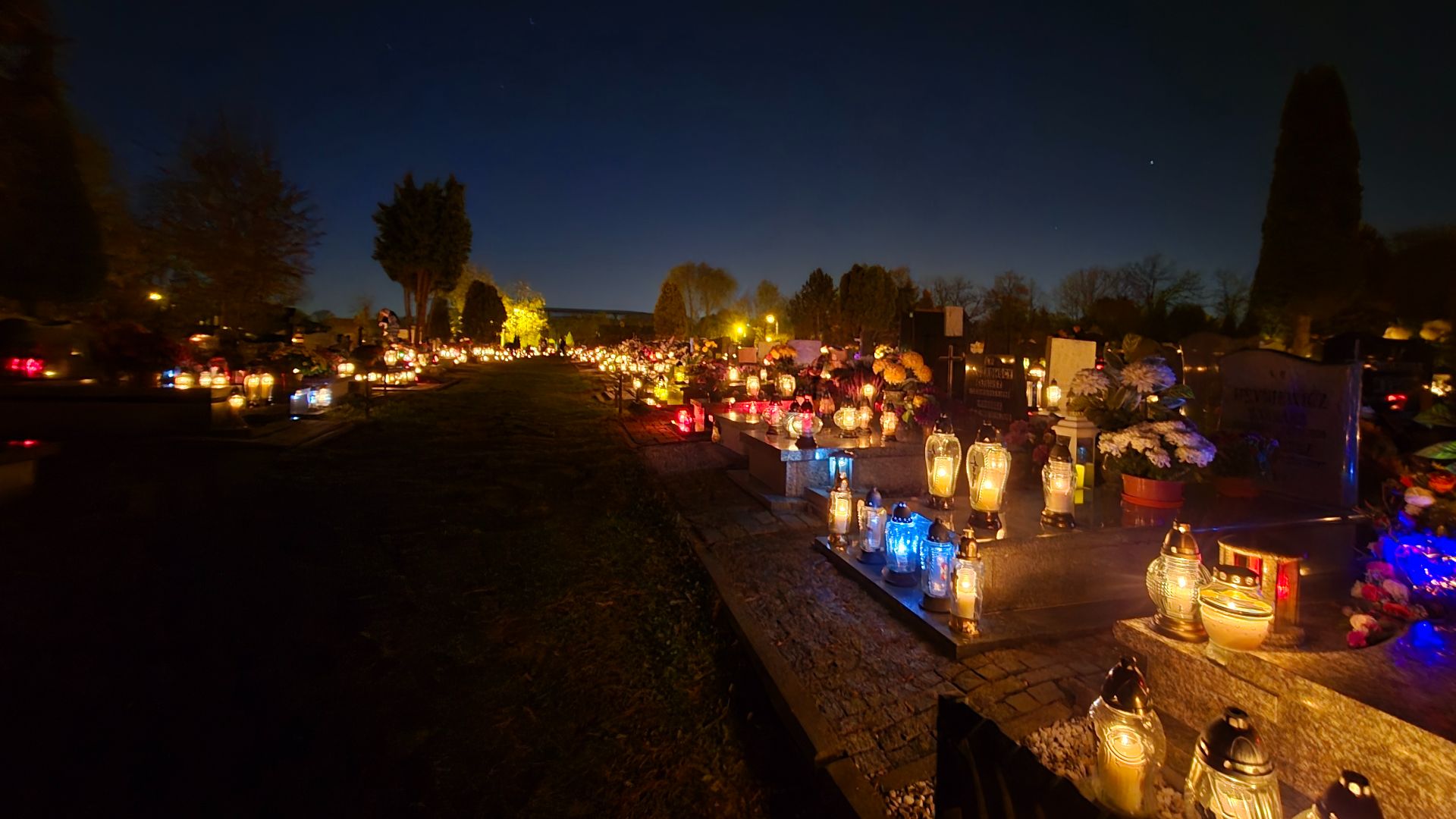 File:Graves in a Polish cemetery, decorated with candles for All Saints' Day on November 1st, Zabrze, Silesian Voivodeship, Poland, November 2024 (3).jpg