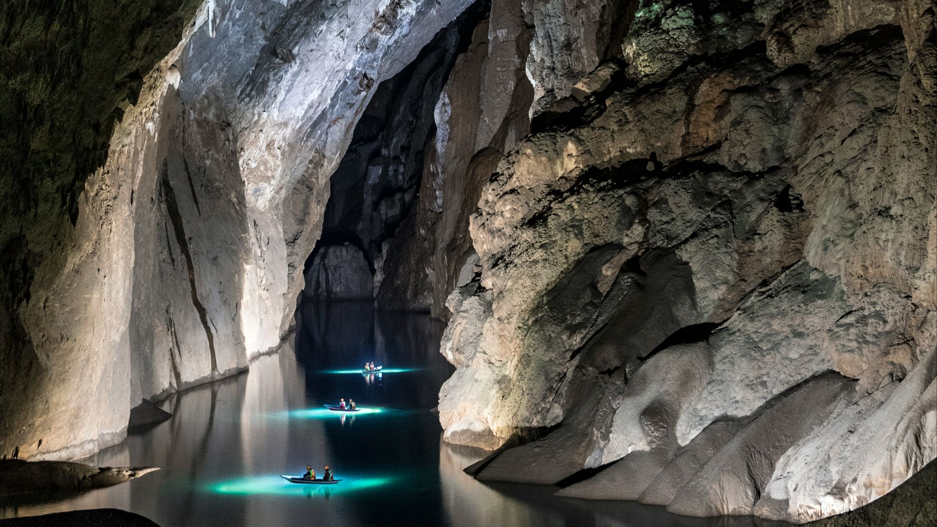 a person sitting on a rock