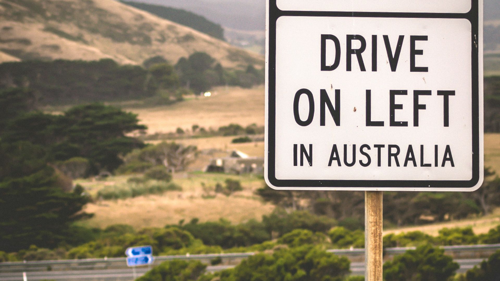Drive On left street signage