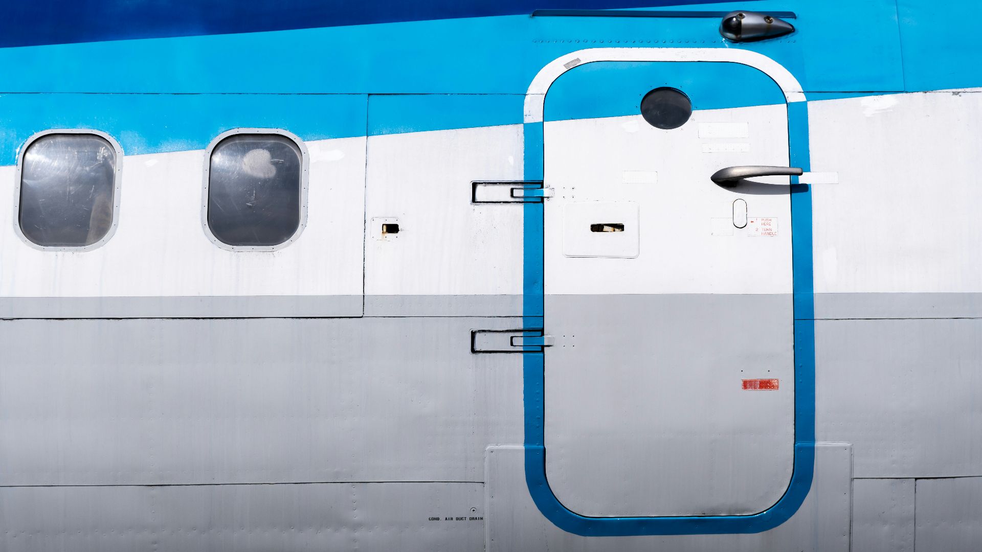 a close up of the door of a plane
