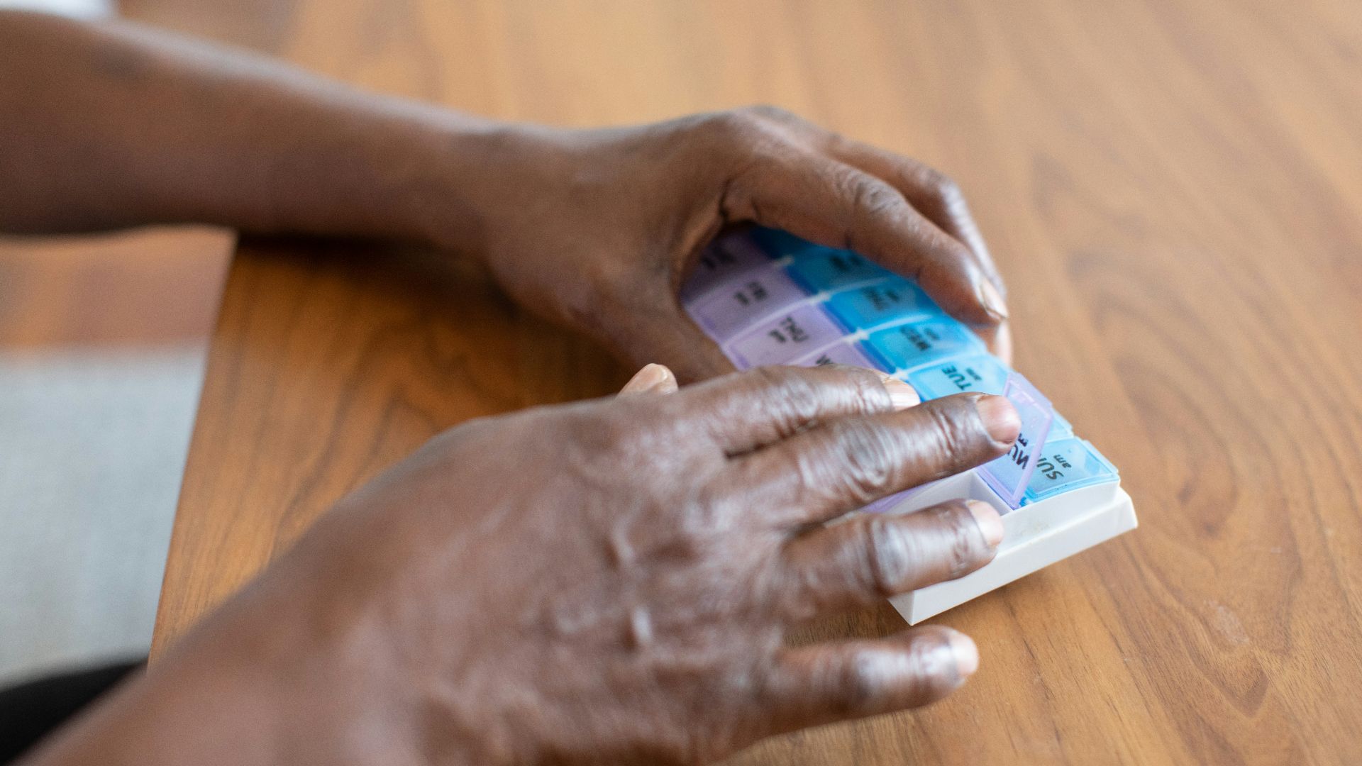a person holding a stack of money