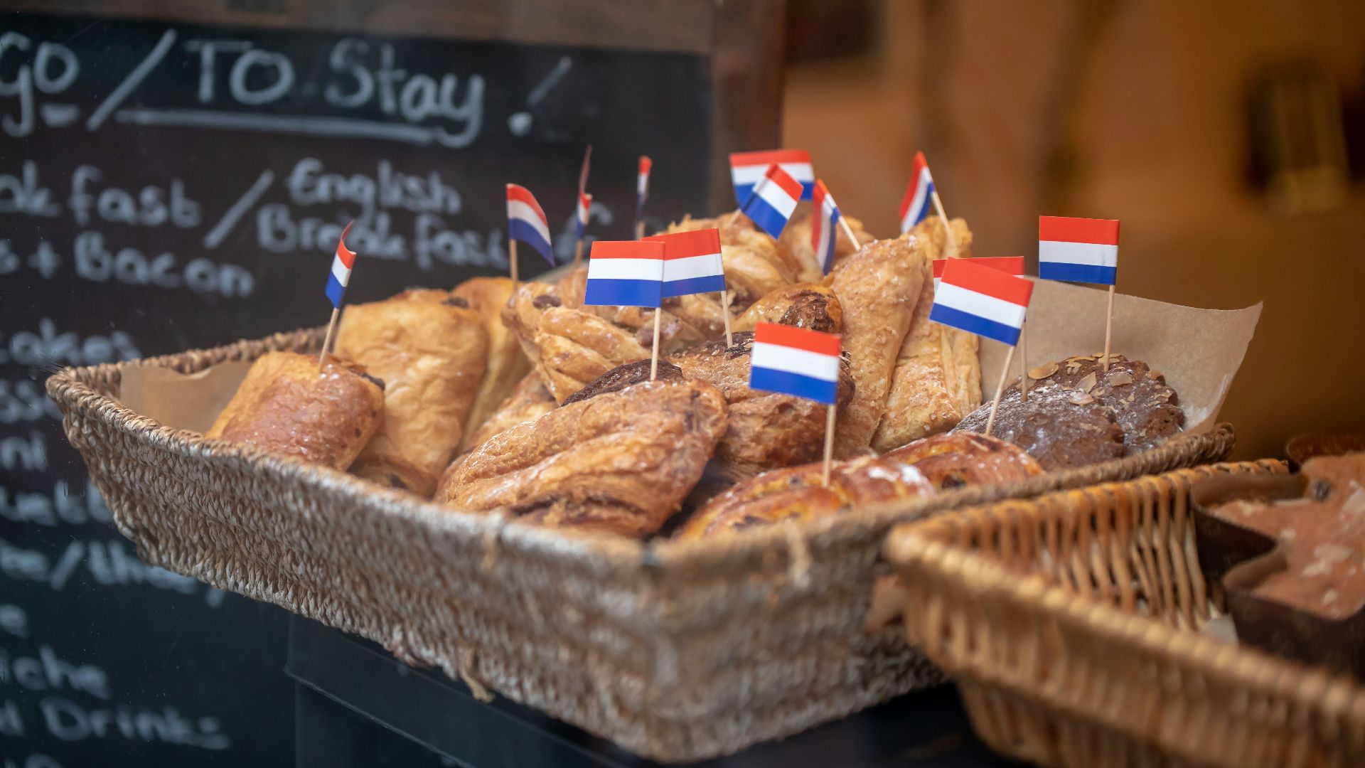 baked pastries on brown wicker basket
