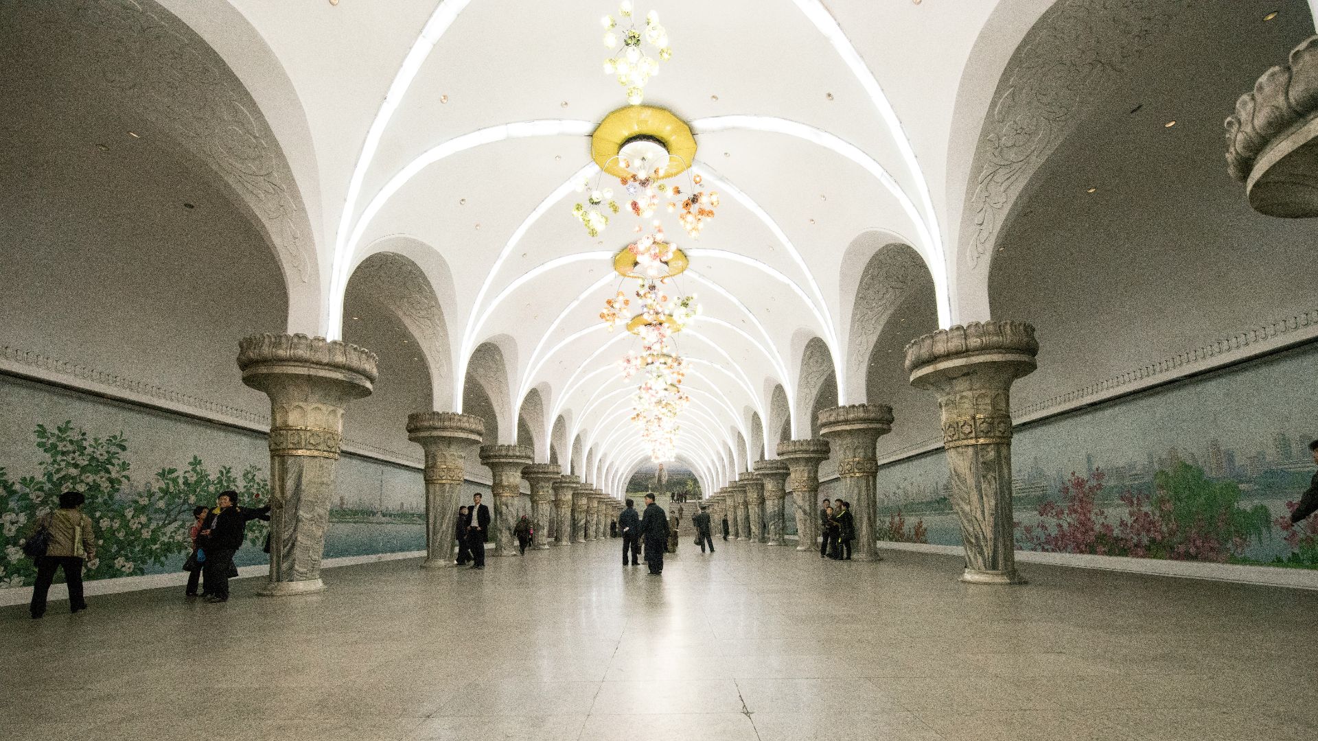 group of people in concrete building
