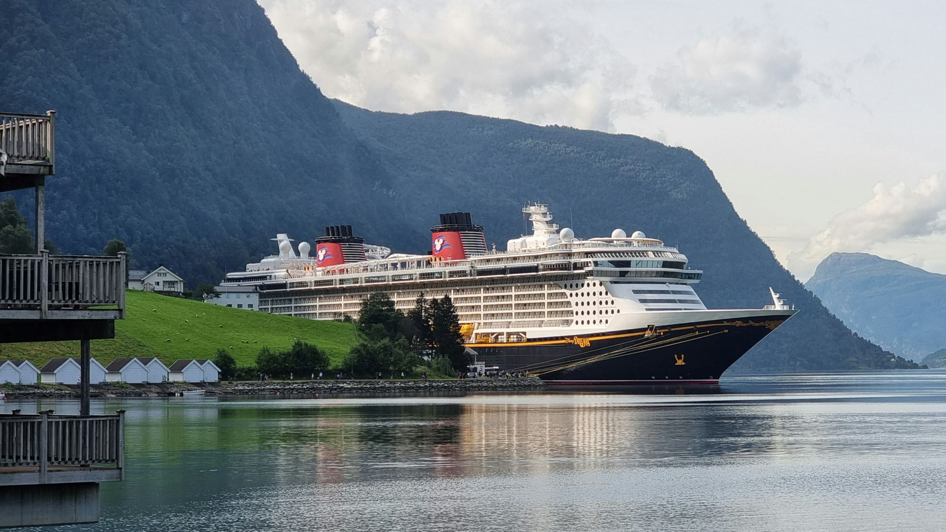 a cruise ship is docked in the water