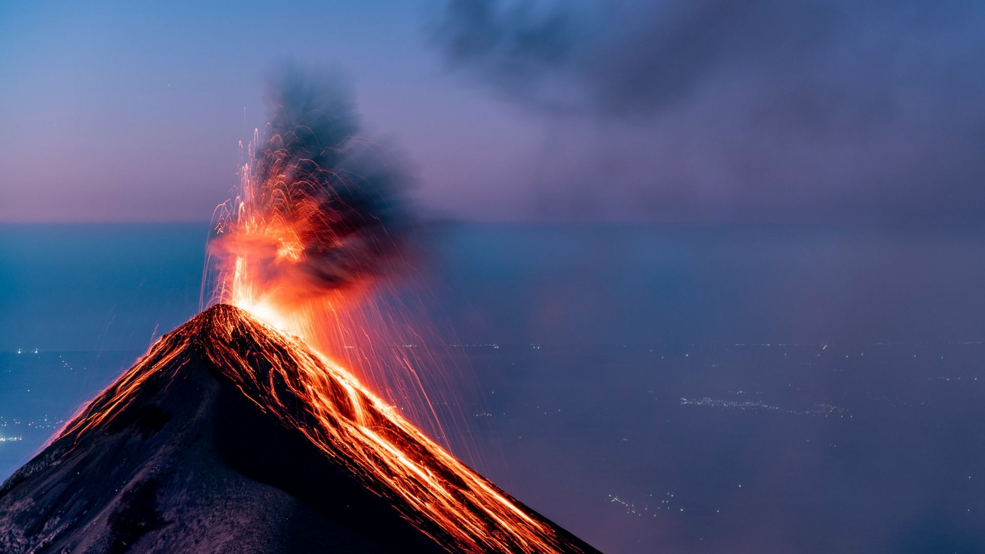 white clouds over snow covered mountain
