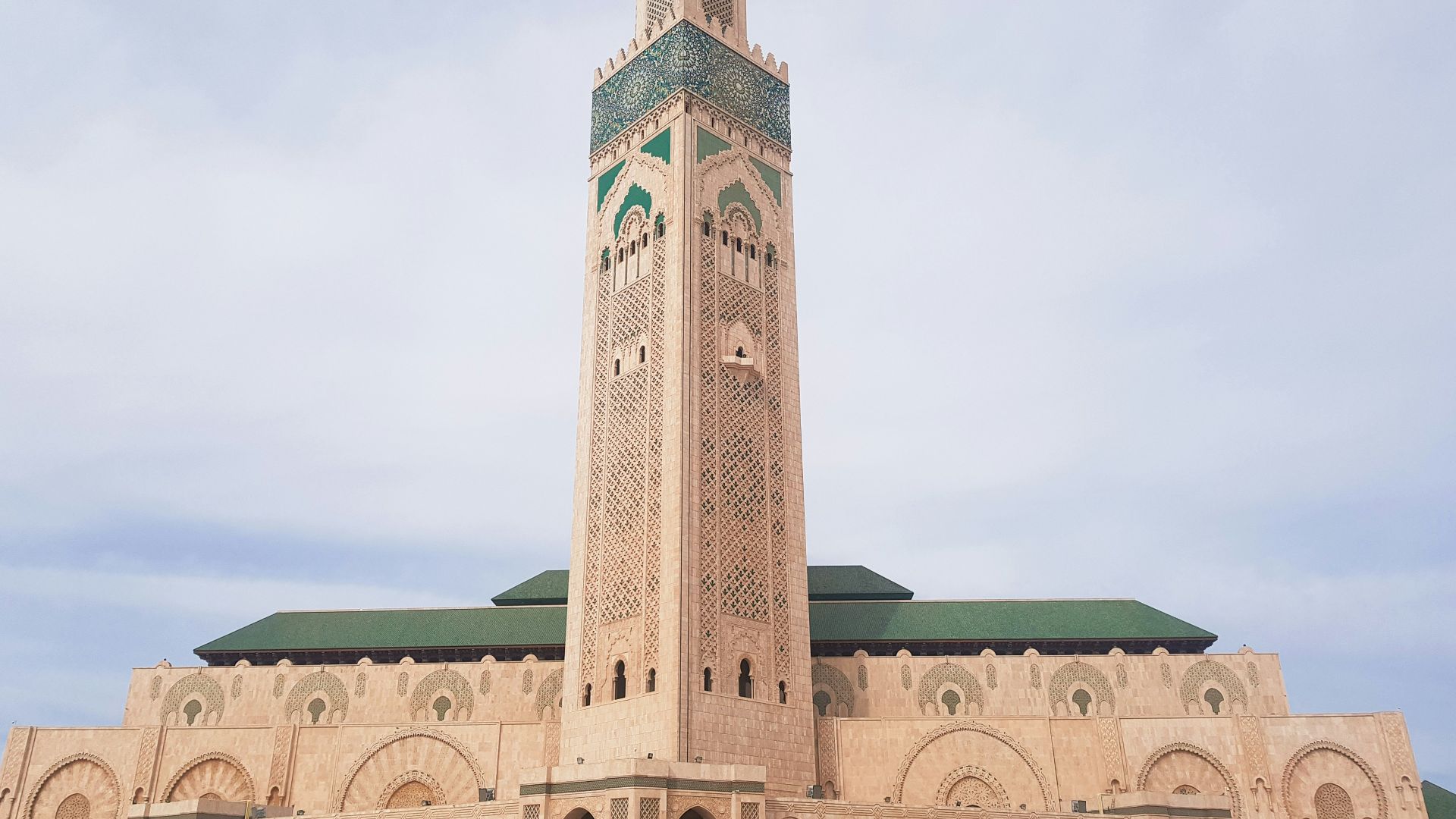 brown concrete building under blue sky during daytime