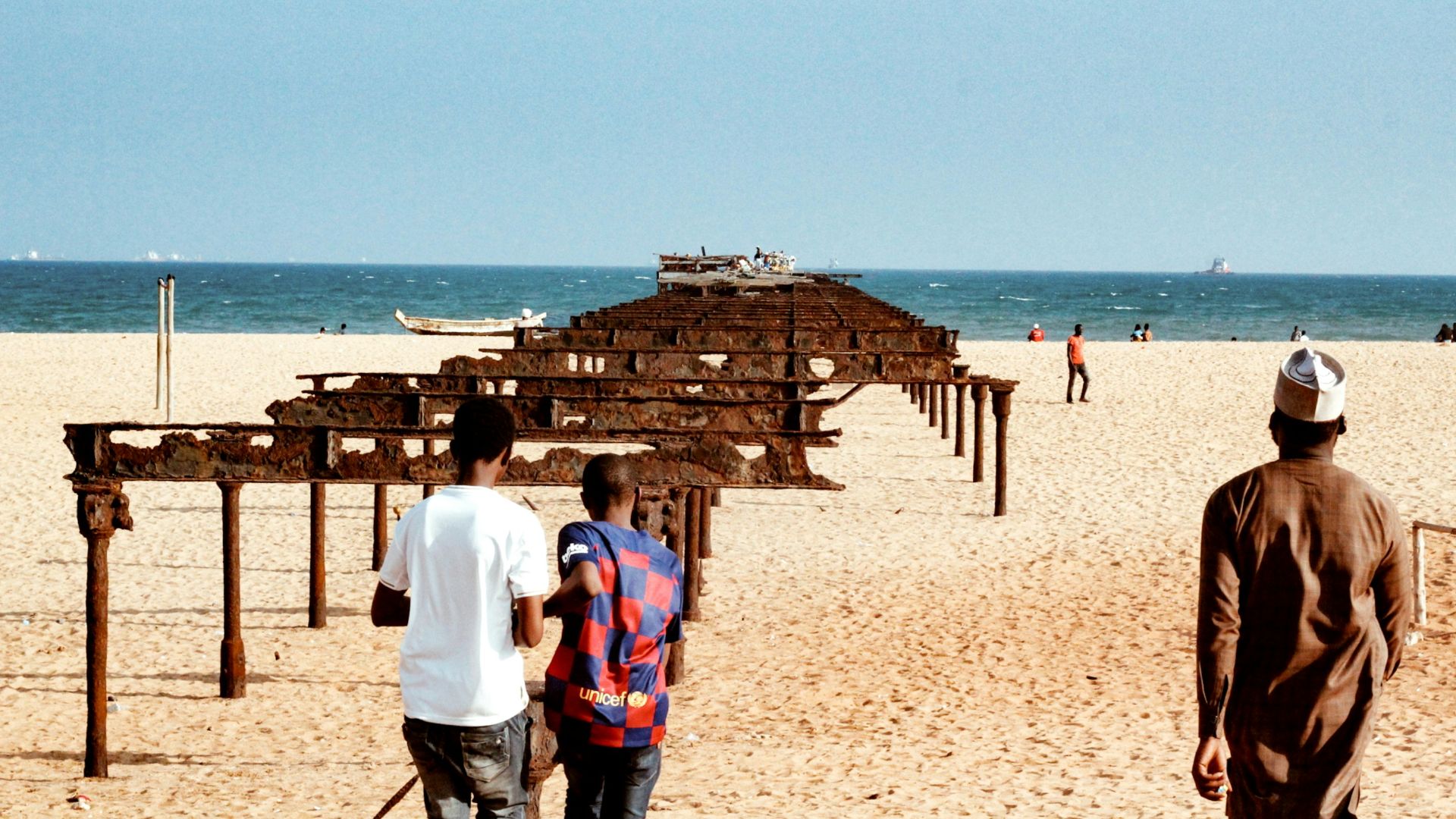 people walking on beach during daytime