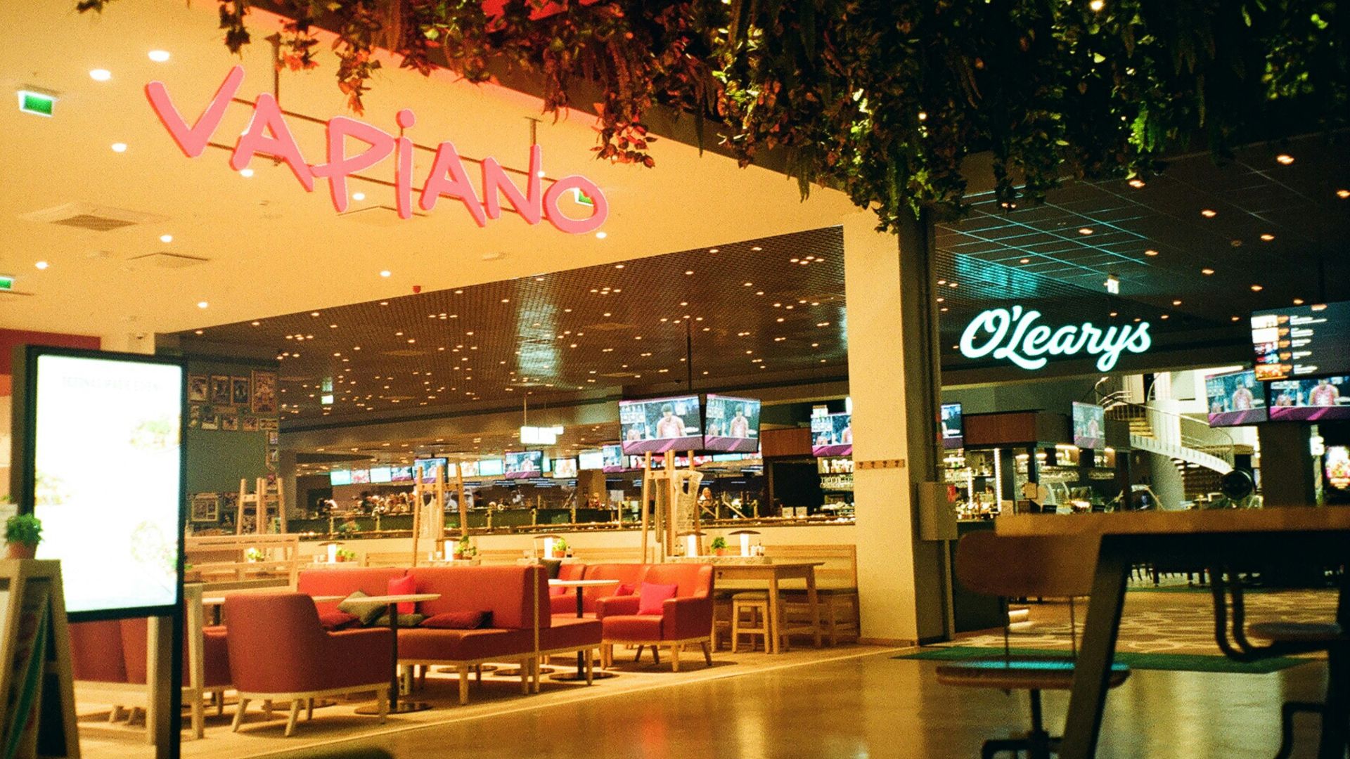 a restaurant with tables and chairs inside of it