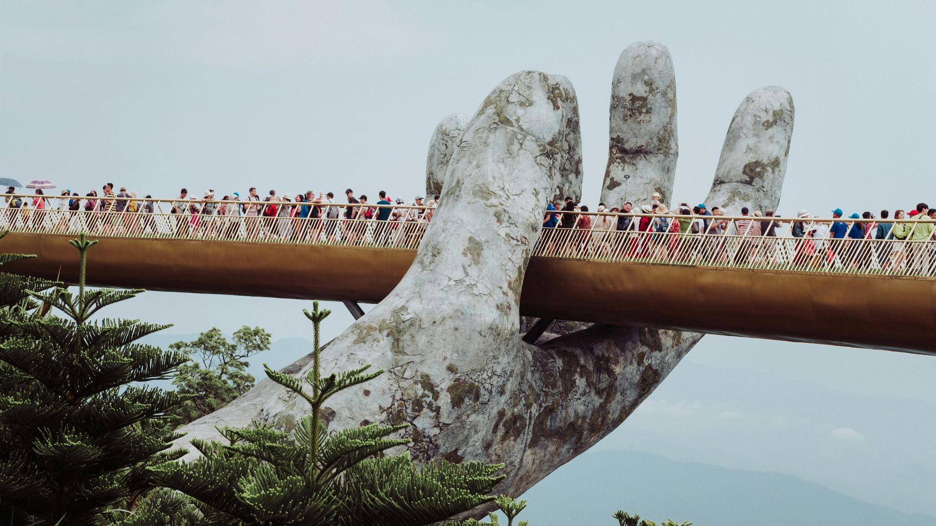 people walking on bridge during daytime